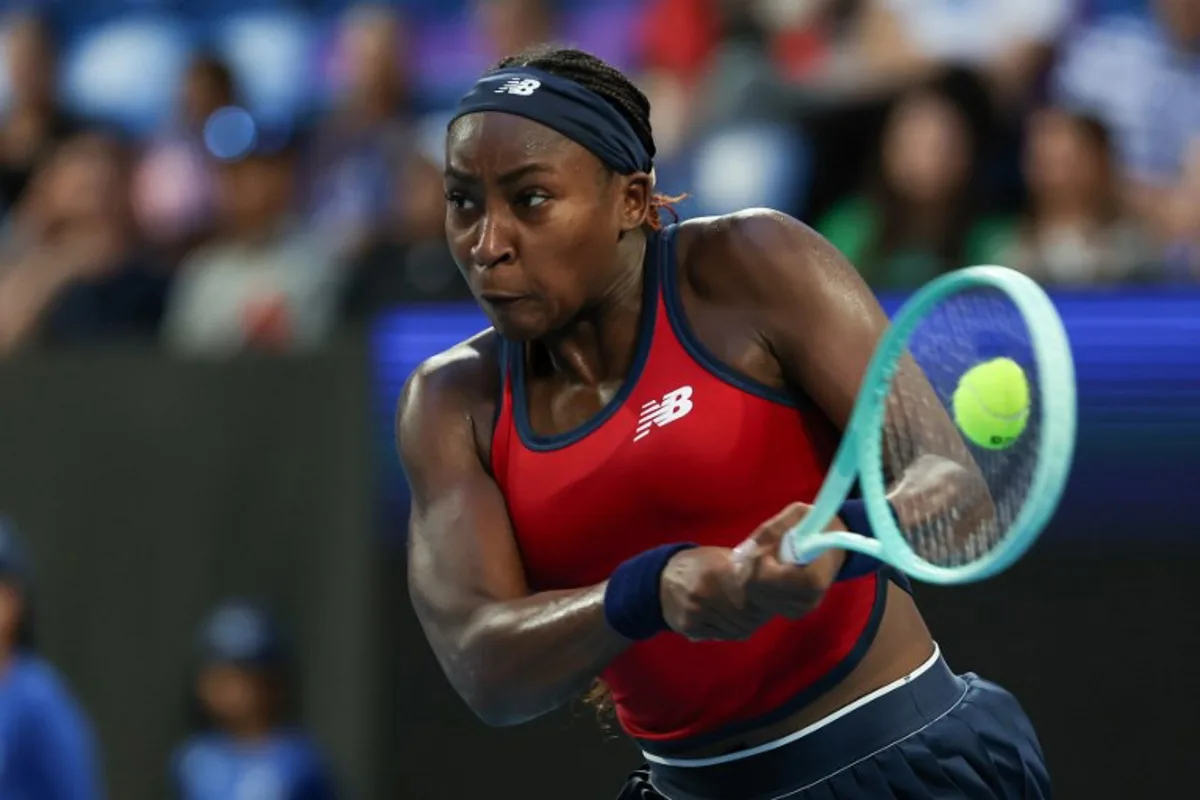 USA's Coco Gauff hits a return to China's Gao Xinyu during their women's single match at the United Cup tennis tournament in Perth on January 1, 2025.  COLIN MURTY / AFP