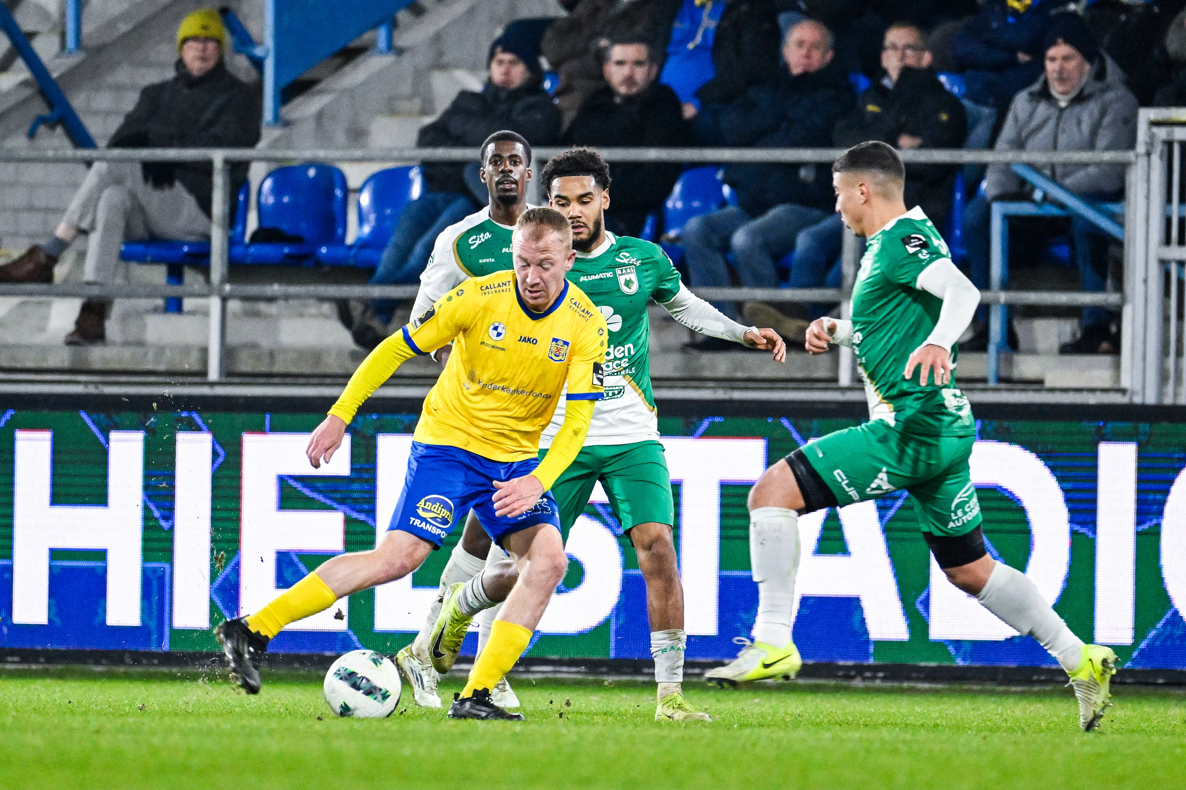 Beveren's Christian Bruls and RAAL's Maxime Xavier Pau pictured in action during a soccer match between SK Beveren and RAAL La Louviere, Sunday 12 January 2025 in Beveren-Waas, on day 17 of the 2024-2025 'Challenger Pro League' 1B second division of the Belgian championship. BELGA PHOTO TOM GOYVAERTS