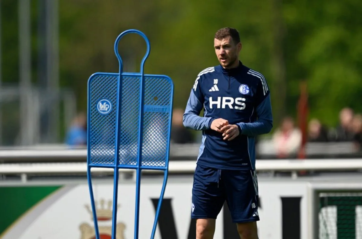 FC Schalke's Bosnian forward Edin Dzeko attends a training session at the training grounds of German Bundesliga second football division soccer club FC Schalke 04 in Gelsenkirchen, western Germany, on April 24, 2026.  Ina FASSBENDER / AFP