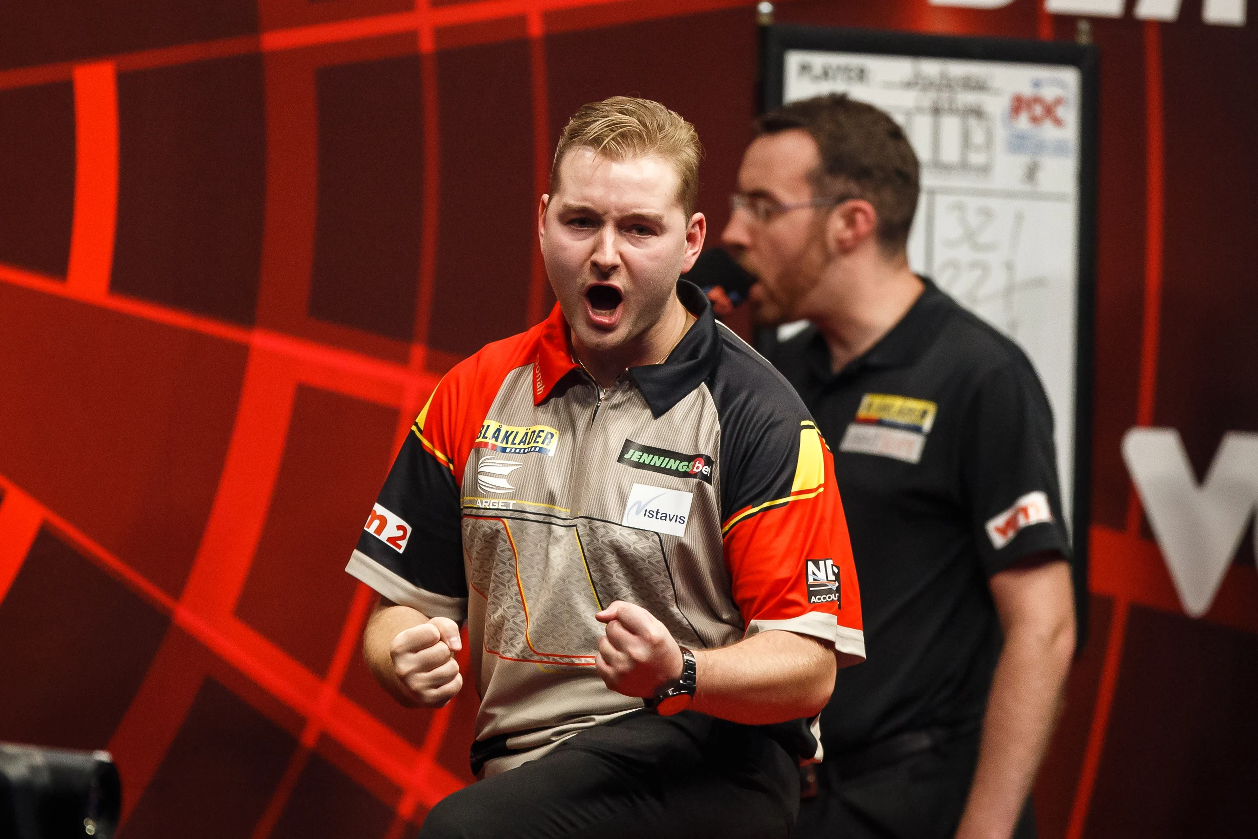 Belgian Dimitri Van den Bergh celebrates on the second day of the Belgian Darts Open, a tournament in the European Tour that takes places from September 23 until September 25 in Wieze, Saturday 24 September 2022. BELGA PHOTO JEF MATTHEE