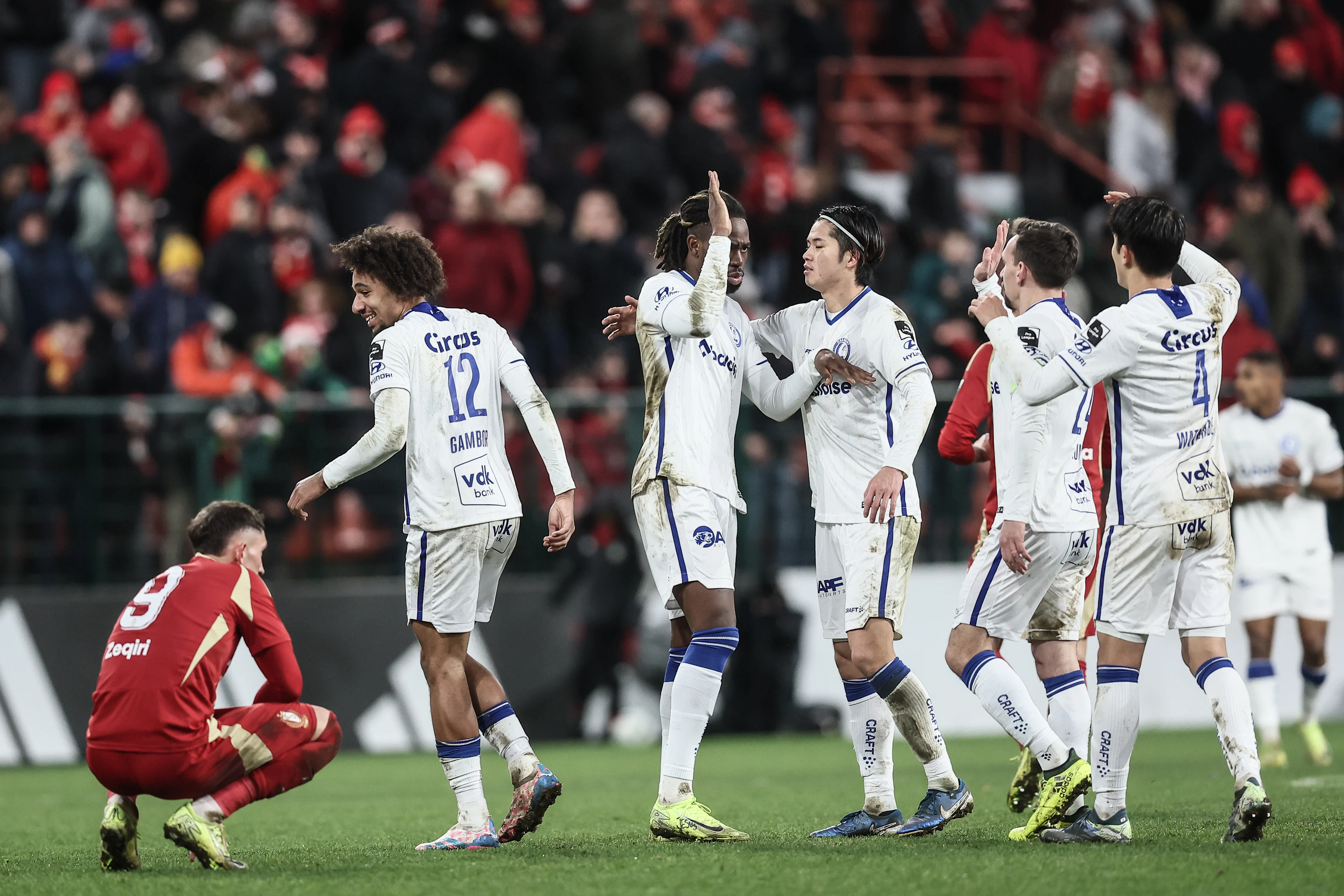 Gent's players celebrate after winning a soccer game between Standard de Liege and Kaa Gent, Sunday 22 December 2024 in Liege, on day 19 of the 2024-2025 season of the "Jupiler Pro League" first division of the Belgian champiosnhip. BELGA PHOTO BRUNO FAHY