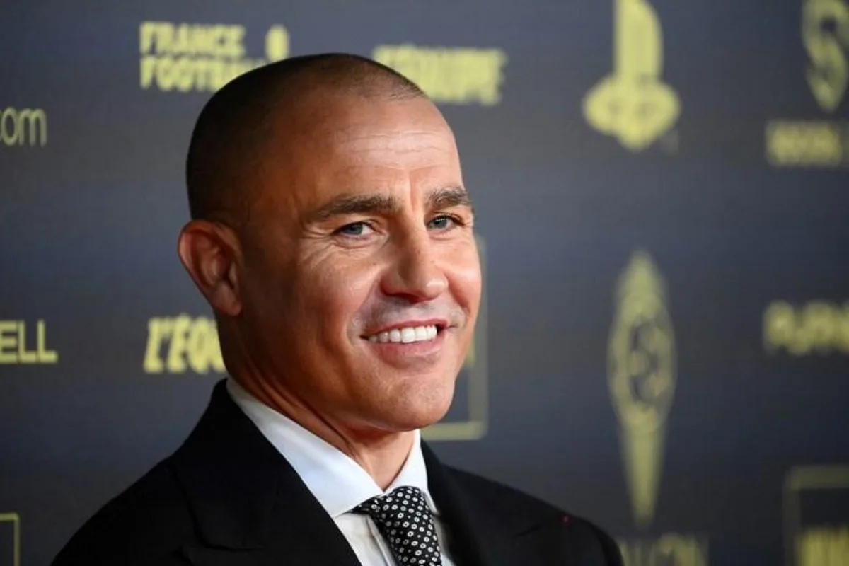 Italian former football player Fabio Cannavaro poses upon arrival to attend the 2021 Ballon d'Or France Football award ceremony at the Theatre du Chatelet in Paris on November 29, 2021.  FRANCK FIFE / AFP