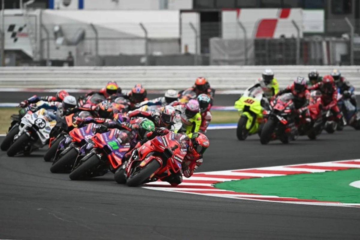 Ducati Lenovo Team's  Italian rider Francesco Bagnaia leads the pack at the start of the San Marino MotoGP race at the Misano World Circuit Marco-Simoncelli in Misano Adriatico on September 8, 2024.  Gabriel BOUYS / AFP