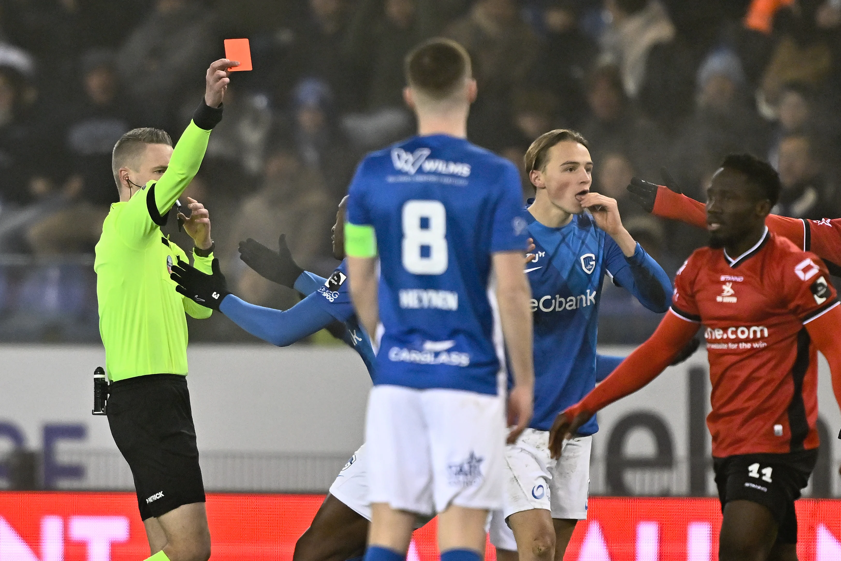 Genk's Matte Smets receives a red card from the referee during a soccer game between KRC Genk and Oud-Heverlee Leuven, Saturday 11 January 2025 in Genk, on day 21 of the 2024-2025 season of the "Jupiler Pro League" first division of the Belgian championship. BELGA PHOTO JOHAN EYCKENS