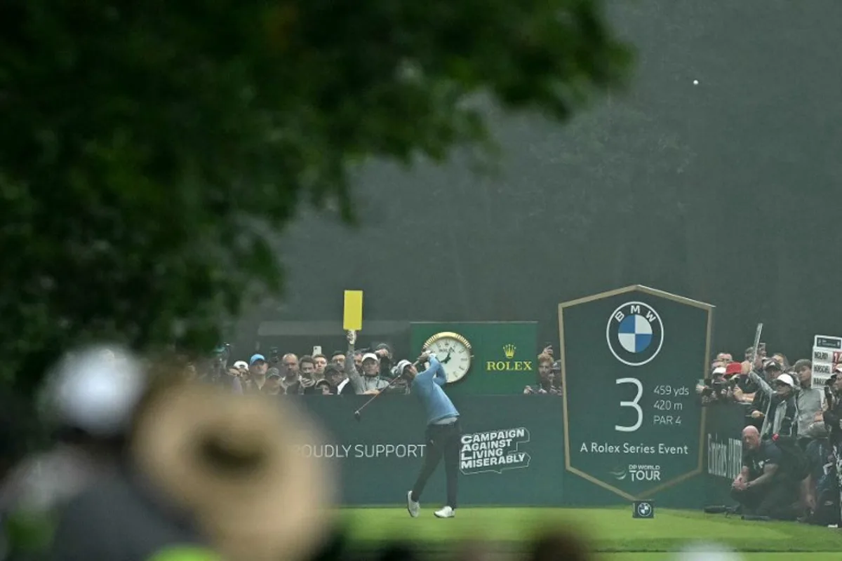 Italy's Matteo Manassero plays from the 3rd tee on day four of the BMW PGA Championship at Wentworth Golf Club, south-west of London, on September 22, 2024.  Glyn KIRK / AFP