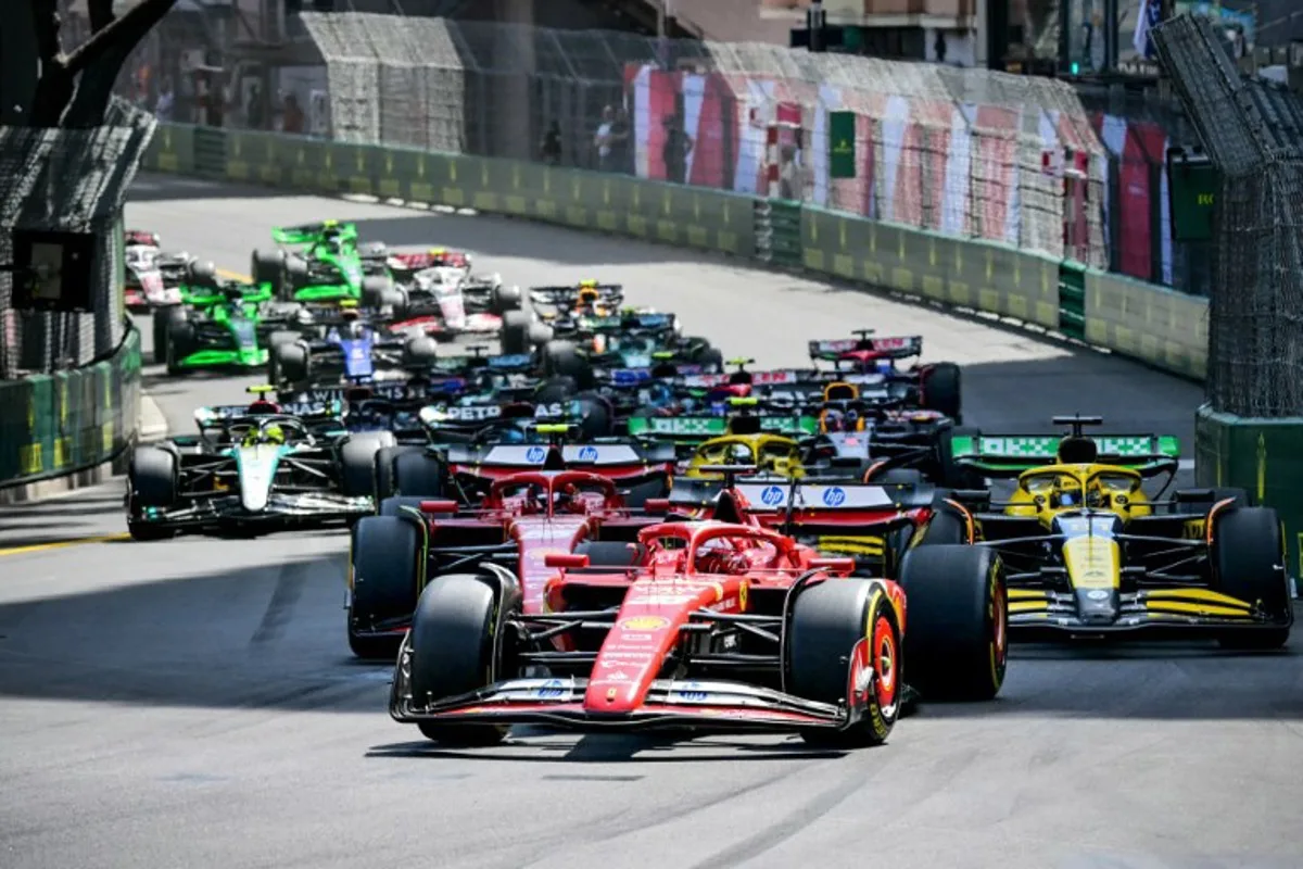 Ferrari's Monegasque driver Charles Leclerc leads at the start of the Formula One Monaco Grand Prix on May 26, 2024 at the Circuit de Monaco.  ANDREJ ISAKOVIC / AFP