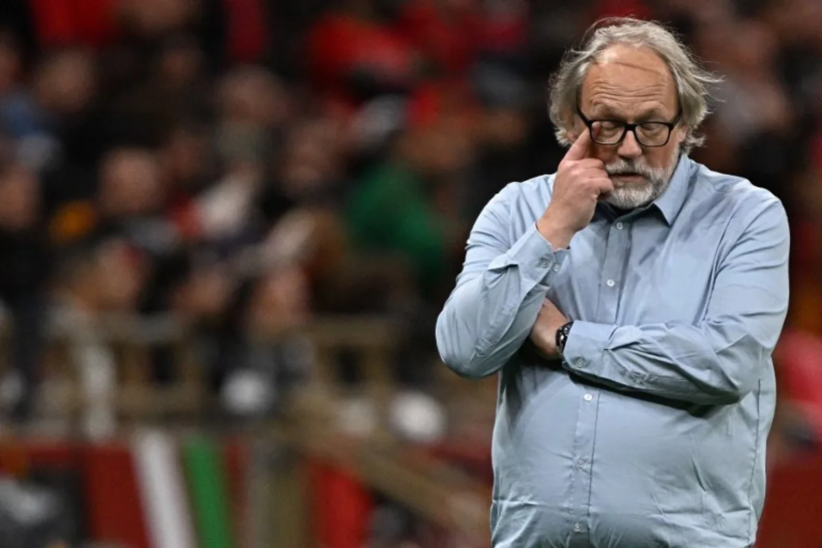 Mali's head coach Tom Saintfiet reacts after his team scored during the Africa Cup of Nations (CAN) Group A football match between Morocco and Mali at Prince Moulay Abdellah Stadium in Rabat on December 26, 2025.   Gabriel BOUYS / AFP