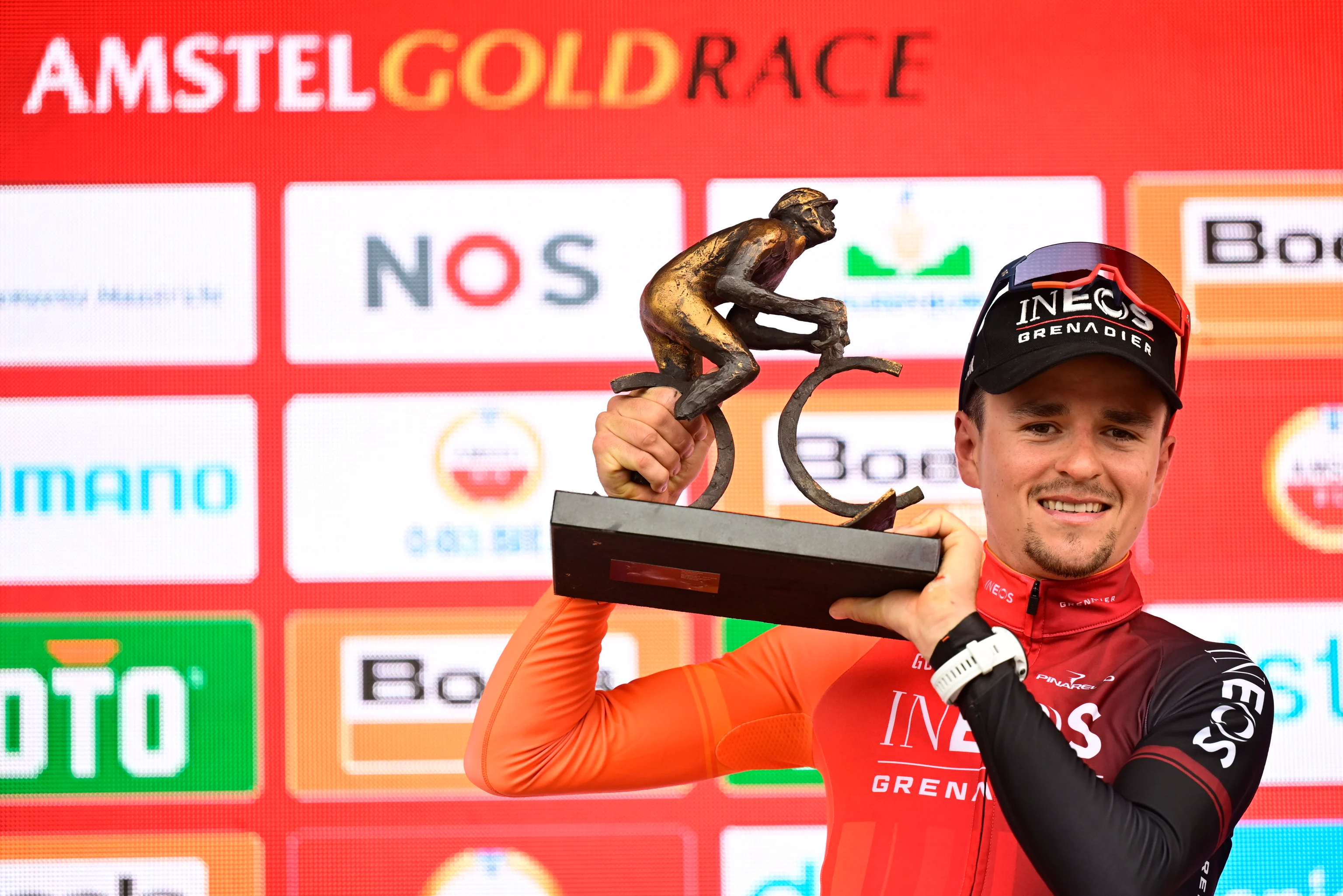 Winner British Tom Pidcock of Ineos Grenadiers celebrates on the podium of the men elite 'Amstel Gold Race' one day cycling race, 253,6 km from Maastricht to Valkenburg, The Netherlands, Sunday 14 April 2024. BELGA PHOTO DIRK WAEM