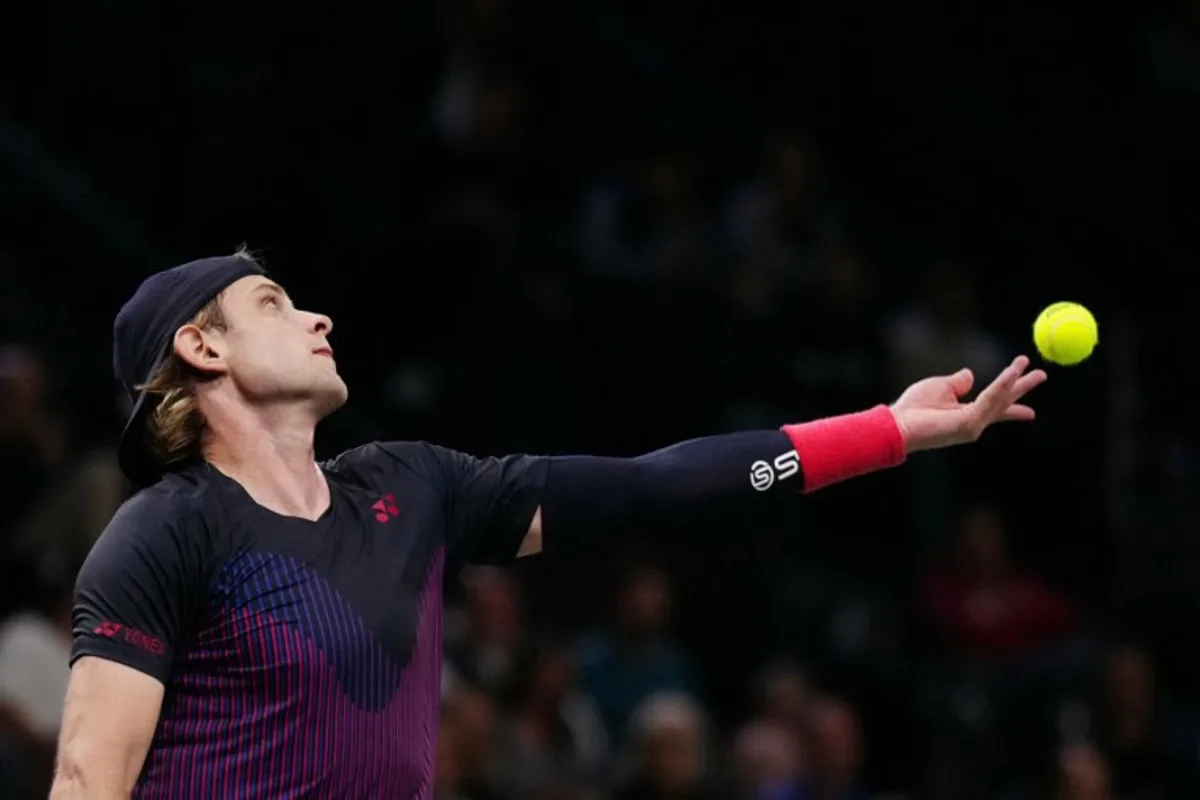 Belgium's Zizou Bergs serves France's Richard Gasquet during their men's singles match on day two of the Paris ATP Masters 1000 tennis tournament at the Accor Arena - Palais Omnisports de Paris-Bercy - in Paris on October 29, 2024.  Dimitar DILKOFF / AFP