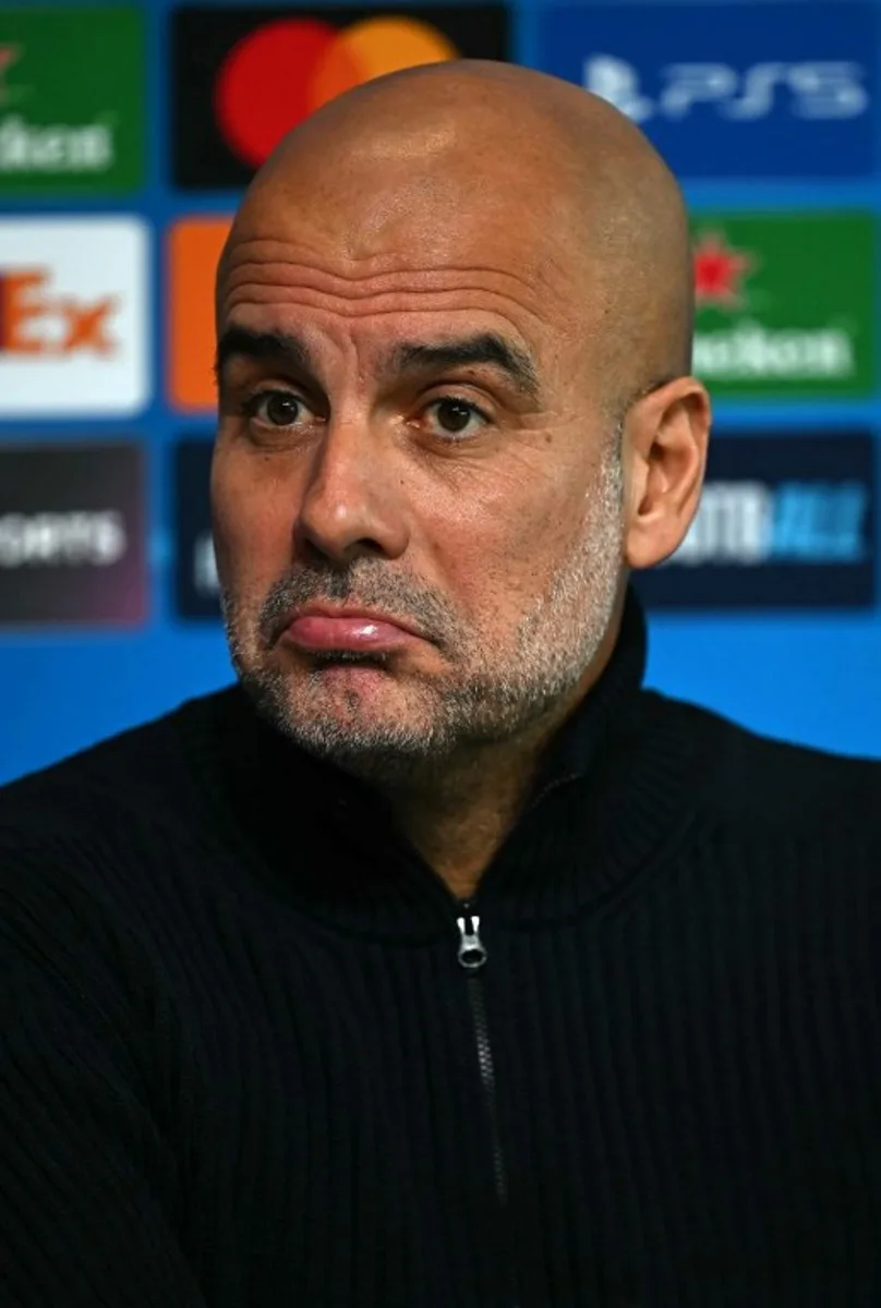 Manchester City's Spanish manager Pep Guardiola attends a press conference at Manchester City's training ground in Manchester, north-west England, on October 22, 2024, on the eve of their UEFA Champions League football match against Sparta Prague.  Paul ELLIS / AFP