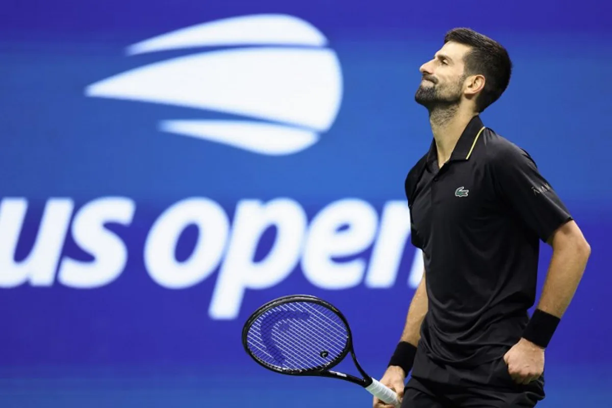Serbia's Novak Djokovic reacts to a point during the men's singles quarterfinal tennis match against USA's Taylor Fritz on day ten of the US Open tennis tournament at the USTA Billie Jean King National Tennis Center in New York City, on September 2, 2025. CHARLY TRIBALLEAU / AFP