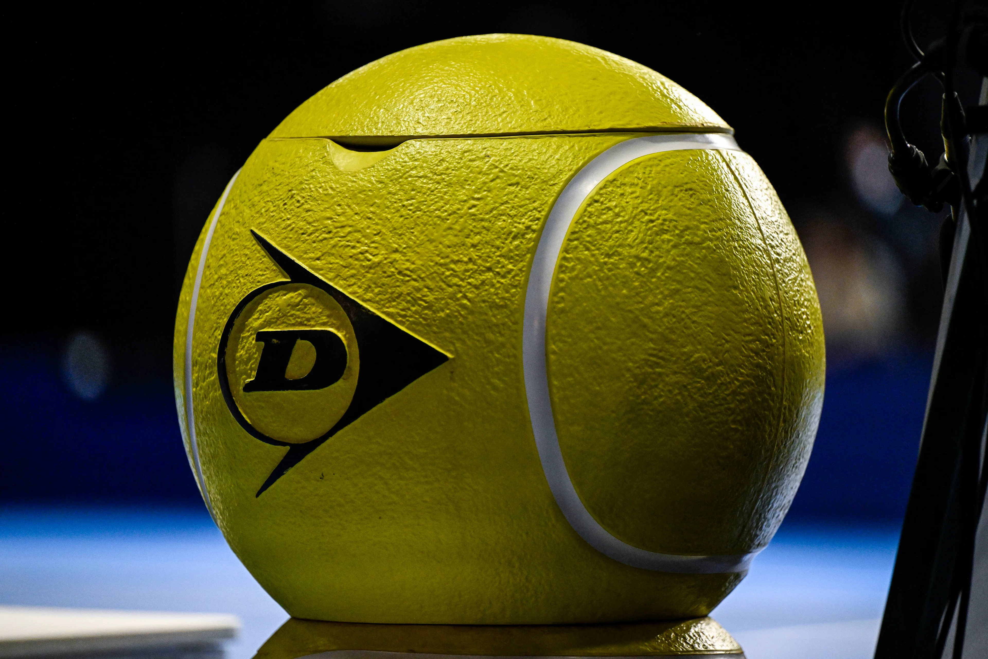 A sponser on the tennis court pictured at the qualifying phase of the European Open Tennis ATP tournament, in Antwerp, Sunday 13 October 2024. BELGA PHOTO TOM GOYVAERTS