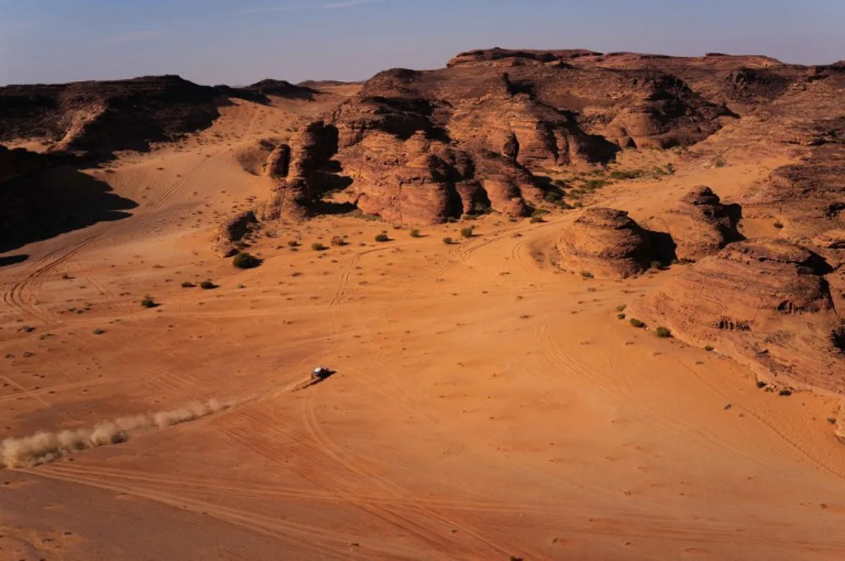 Pilots compete during stage 4 of the Dakar Rally 2025 between Al Henakiyak and Alula, on January 8, 2025.  Valery HACHE / AFP