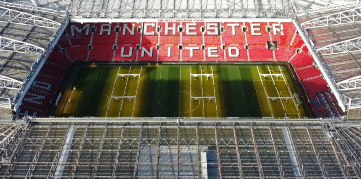 An aerial view shows Old Trafford stadium, home ground of to Manchester United football team, in Manchester, northern England, on November 23, 2022.  Manchester United's owners said Tuesday they were ready to sell the club after it was earlier confirmed star player Cristiano Ronaldo was leaving the Premier League giants. Weeks of turbulence at Old Trafford appeared to have come to an end when the club announced Ronaldo was leaving with "immediate effect". Oli SCARFF / AFP