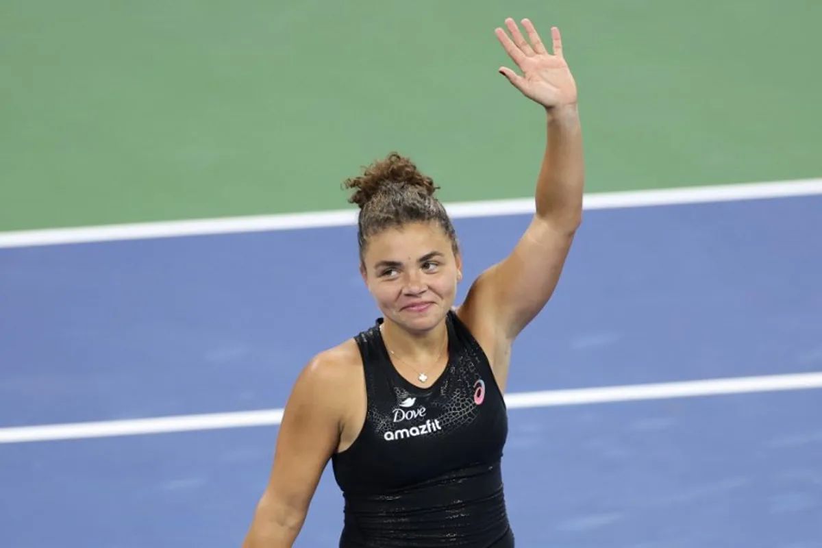 Italy's Jasmine Paolini celebrates after winning her women's singles first round tennis match against Australia's Destanee Aiava on day one of the US Open tennis tournament at the USTA Billie Jean King National Tennis Center in New York City, on August 24, 2025. CHARLY TRIBALLEAU / AFP