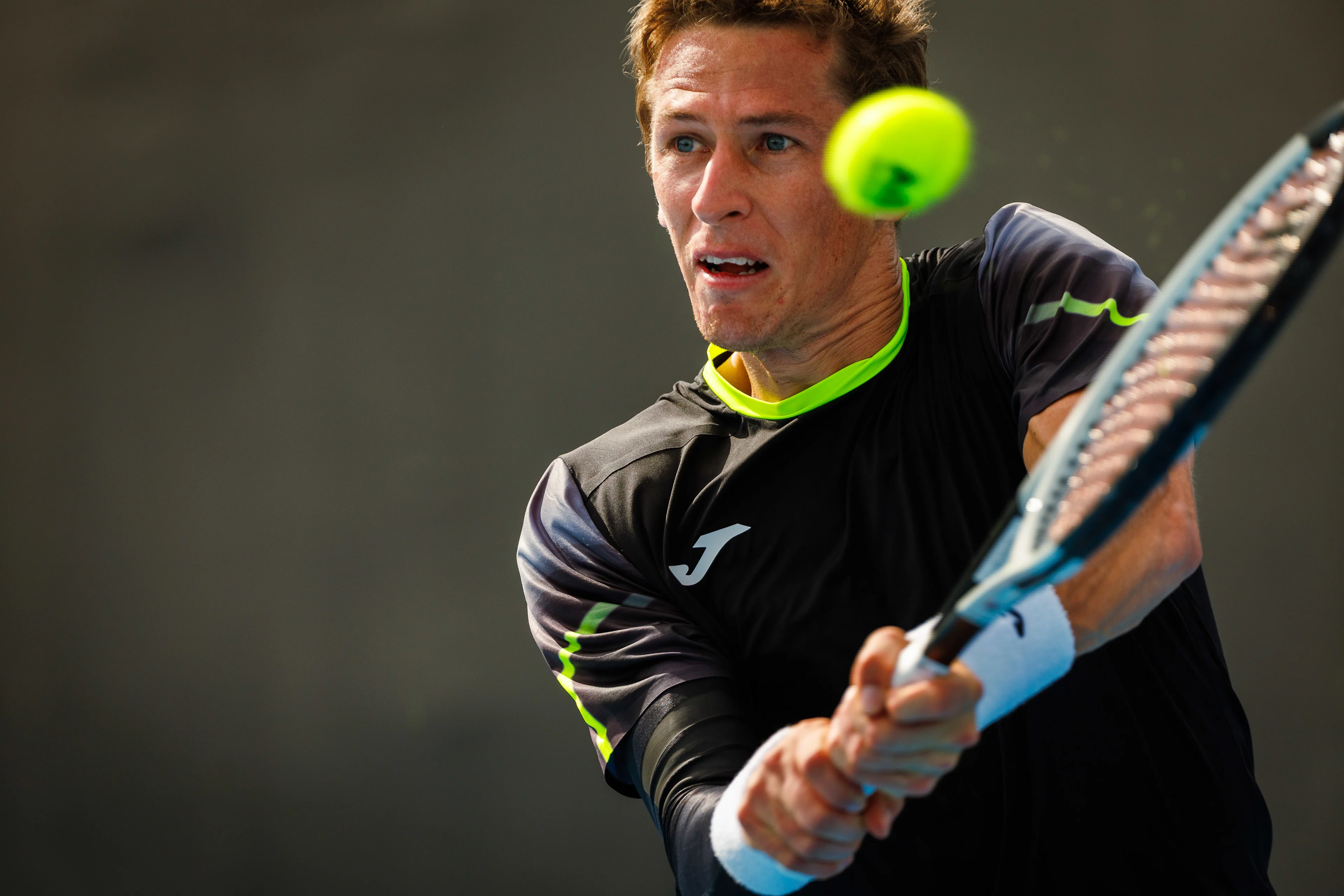 Belgian Kimmer Coppejans pictured in action during a tennis match against Monegasque Vacherot, in the third round of the qualifiers for the men's singles tournament, at the 'Australian Open' Grand Slam tennis tournament, Thursday 09 January 2025 in Melbourne Park, Melbourne, Australia. The 2024 edition of the Australian Grand Slam takes place from January 14th to January 28th. BELGA PHOTO PATRICK HAMILTON