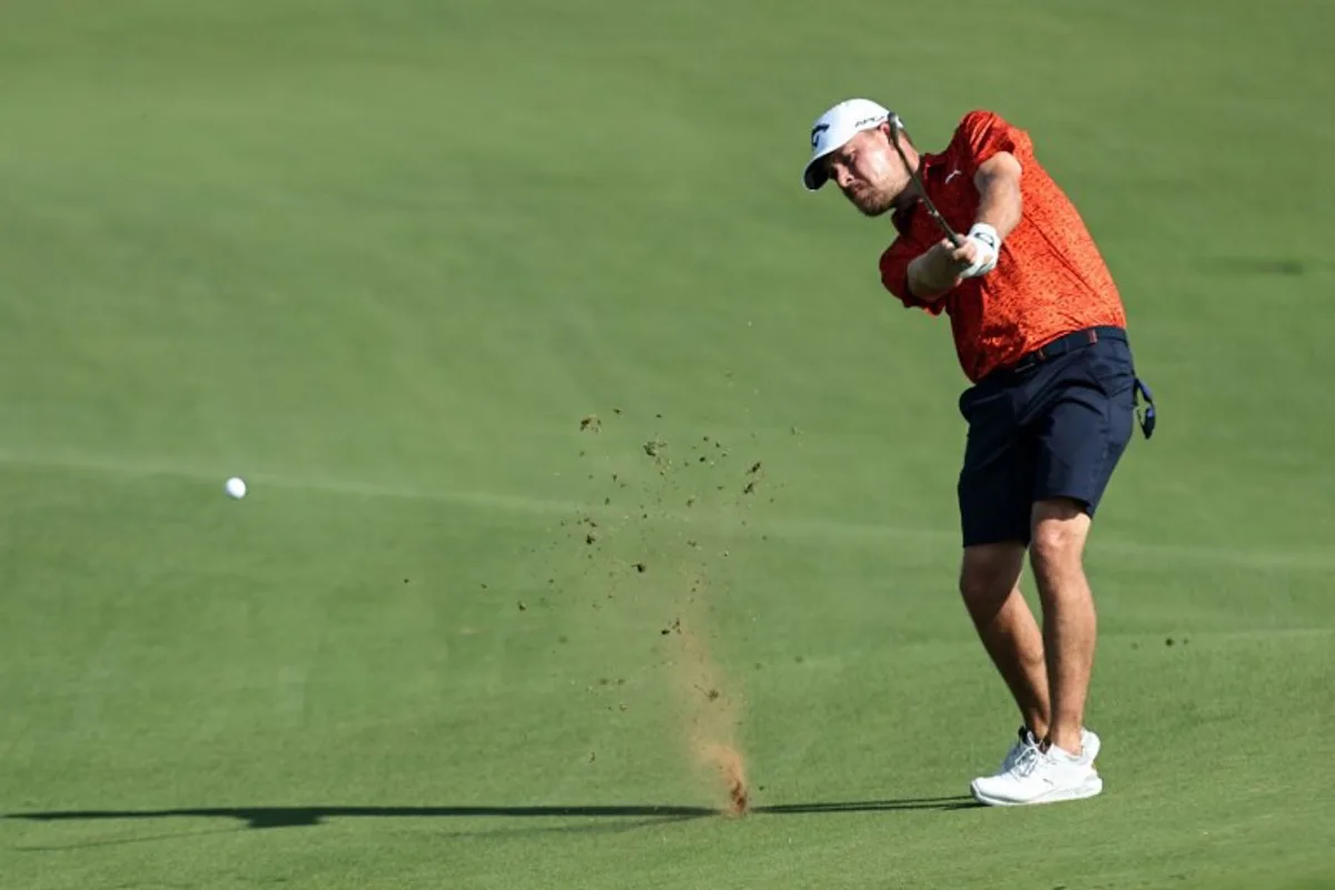Denmark's Jeff Winther plays on the 9th hole during the final round of the DP World Tour Championship golf tournament in Abu Dhabi on November 10, 2024. FADEL SENNA / AFP