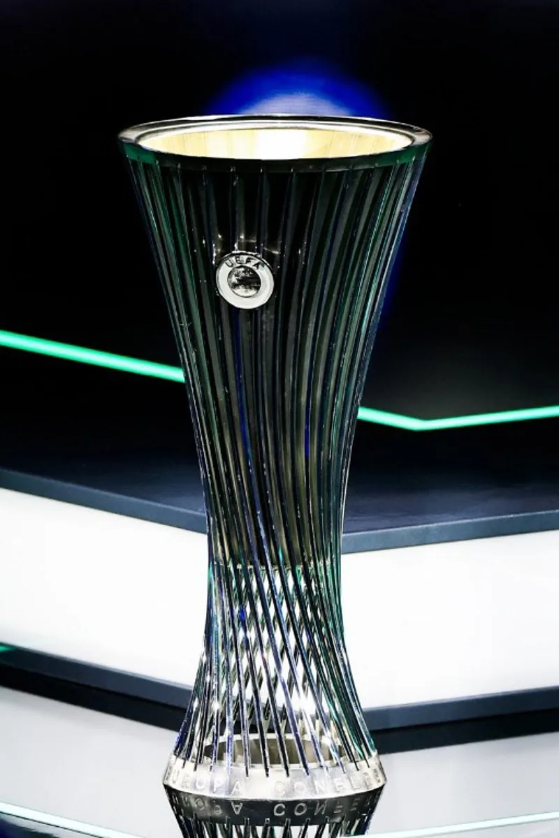 This photograph shows the trophy of the UEFA Conference League tournament during the ceremony of the draw for the group stage of the 2024-2025 UEFA Conference League tournament, at the Grimaldi Forum in Monaco on August 30, 2024.  Valery HACHE / AFP