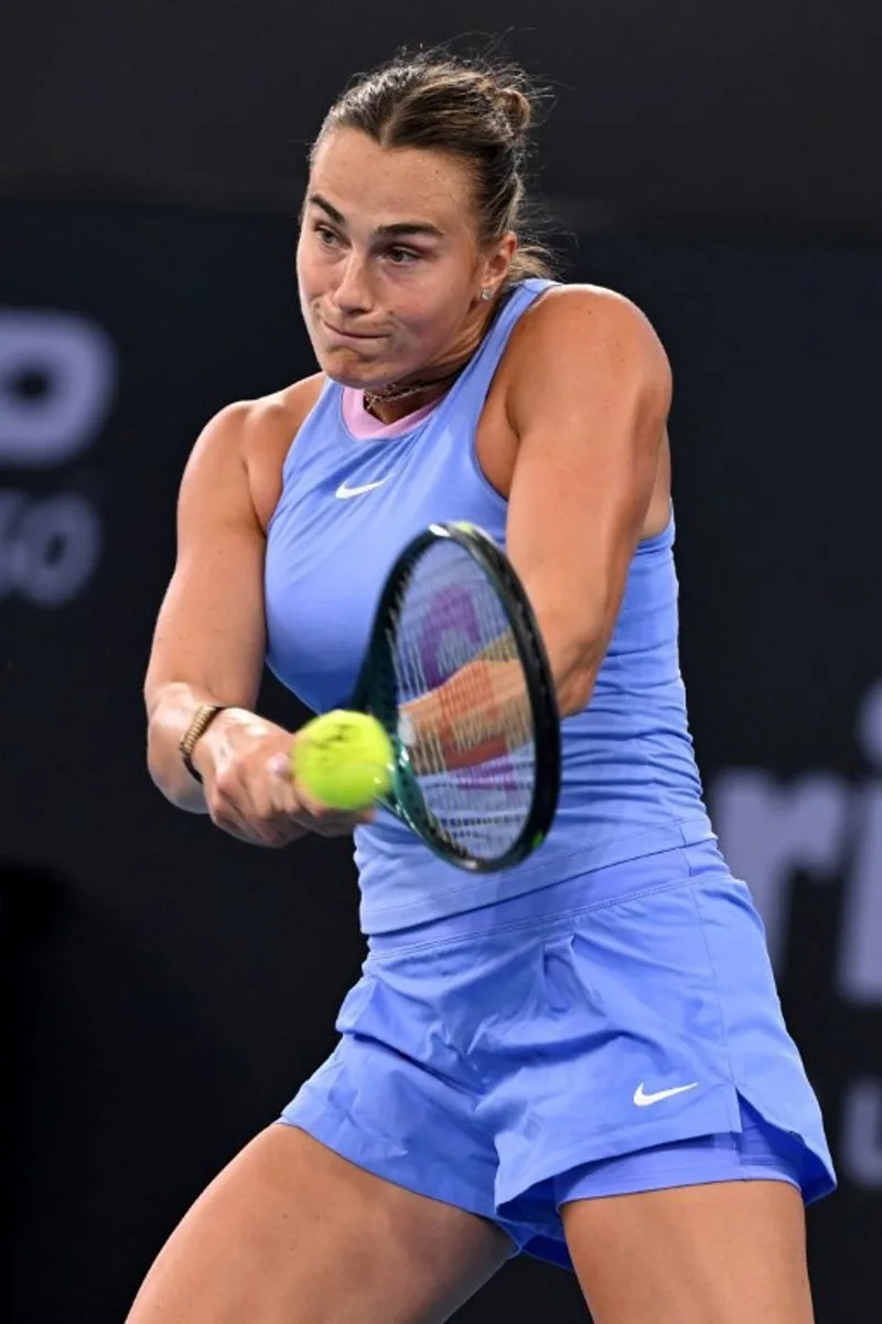 Belarus' Aryna Sabalenka hits a return against Russia's Polina Kudermetova during their women's singles final match at the Brisbane International tennis tournament on Pat Rafter Arena in Brisbane on January 5, 2025.  William WEST / AFP