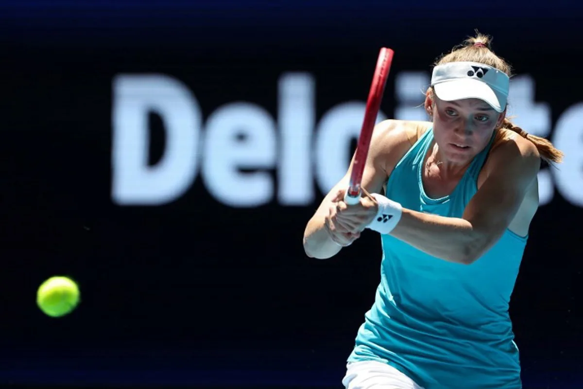 Kazakhstan's Elena Rybakina hits a return against Greece's Maria Sakkari during their women's singles match at the United Cup tennis tournament in Perth on December 30, 2024.  COLIN MURTY / AFP