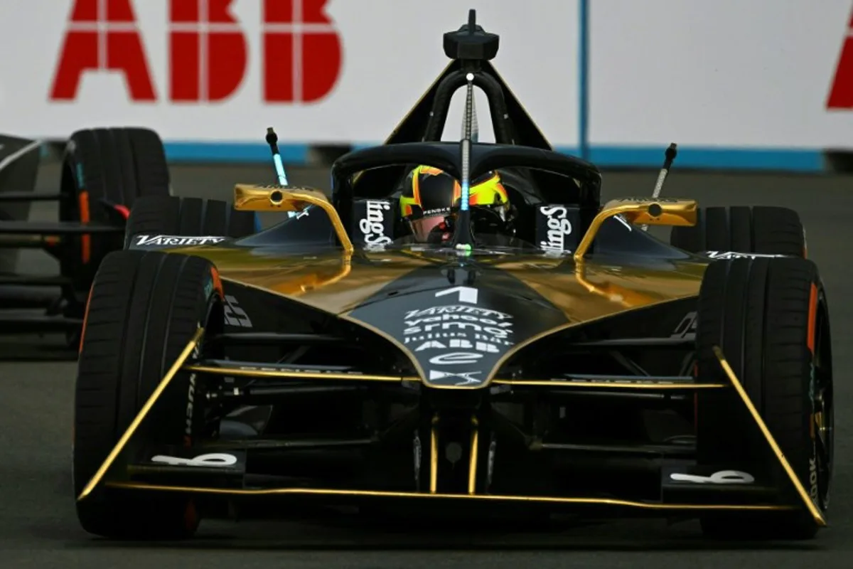 DS Penske's Formula E Belgian driver Stoffel Vandoorne (R) and Maserati MSG Rasing's Formula E German driver Edoardo Mortara (L) compete in the 10th series of the Formula E race at the Jakarta International e-Prix Circuit in Jakarta on June 3, 2023. BAY ISMOYO / AFP