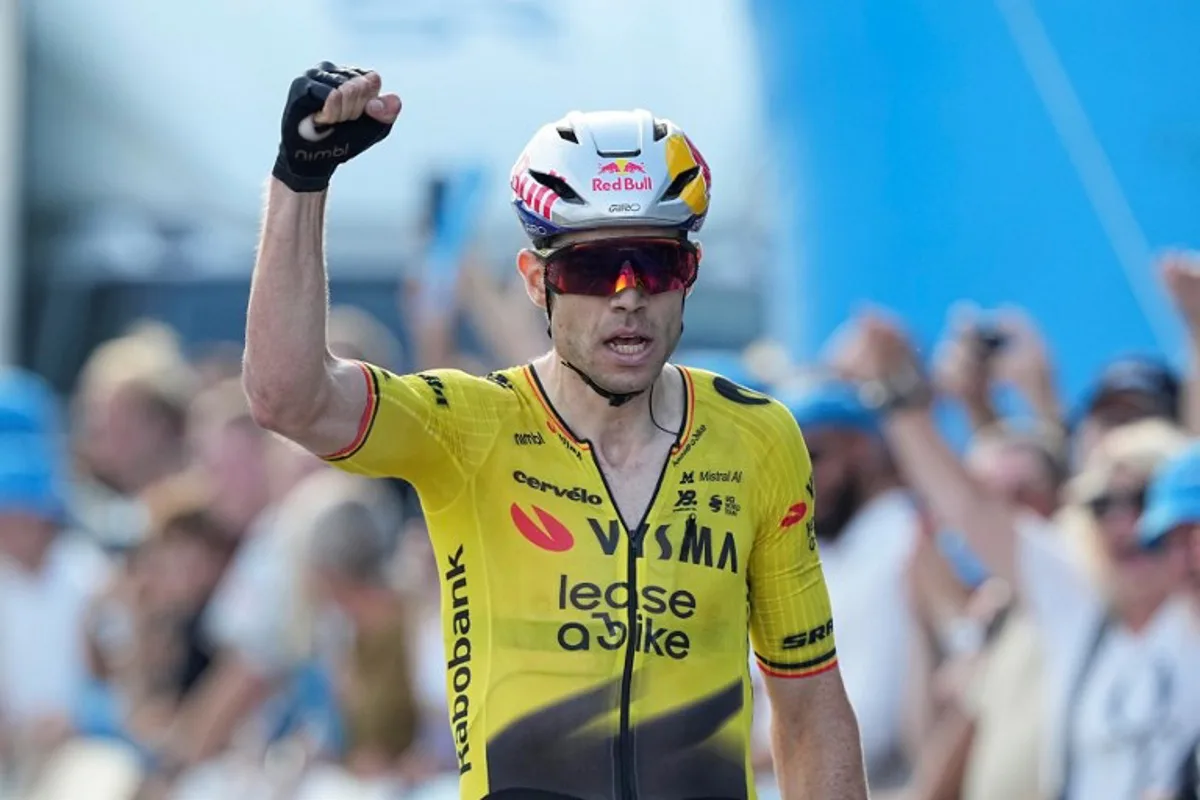 Team Visma - Lease a bike team's Belgian rider Wout van Aert celebrates during Stage 1 of the PostNord Danmark Rundt, in Aalborg on, July 29, 2026.   Bo Amstrup / Ritzau Scanpix / AFP