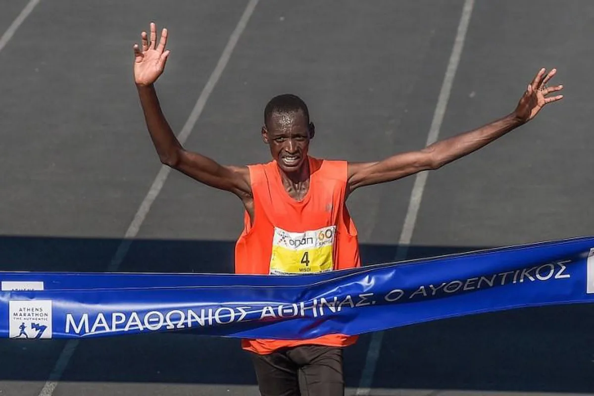 Brimin Kipkorir Misoi from Kenya runs to win the 36th Athens Classic Marathon 'The authentic' at the Panathenaic stadium in Athens on November 11, 2018.   ANGELOS TZORTZINIS / AFP