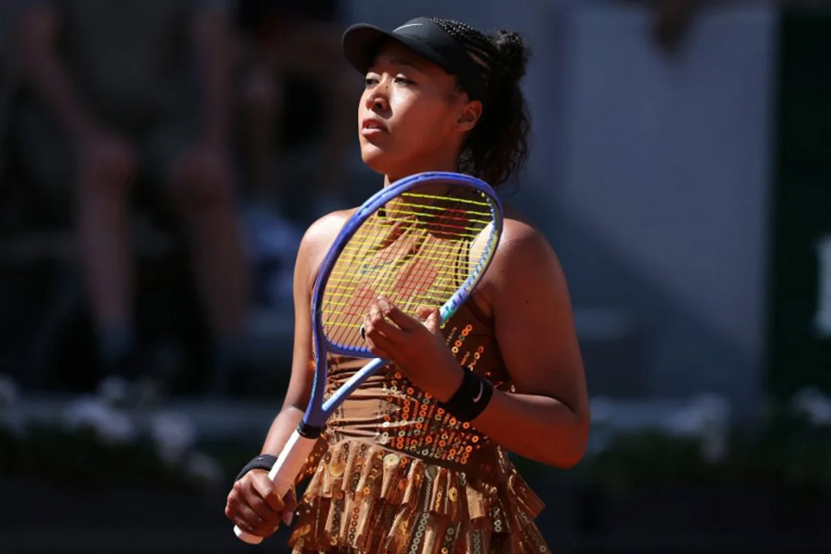 Japan's Naomi Osaka looks on during her women's singles match against Germany's Laura Siegemund on day 3 of the French Open tennis tournament on Court Suzanne-Lenglen at the Roland-Garros Complex in Paris on May 26, 2026. Thomas SAMSON / AFP