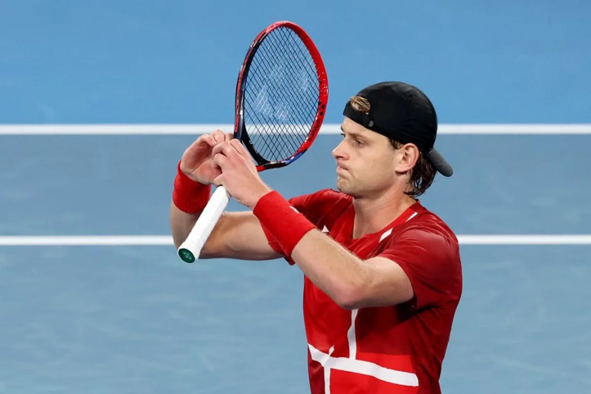 Belgium's Zizou Bergs reacts after defeating Australia's Jordan Thompson in the Davis Cup second-round qualifier tennis match at Ken Rosewall Arena in Sydney on September 13, 2025. DAVID GRAY / AFP