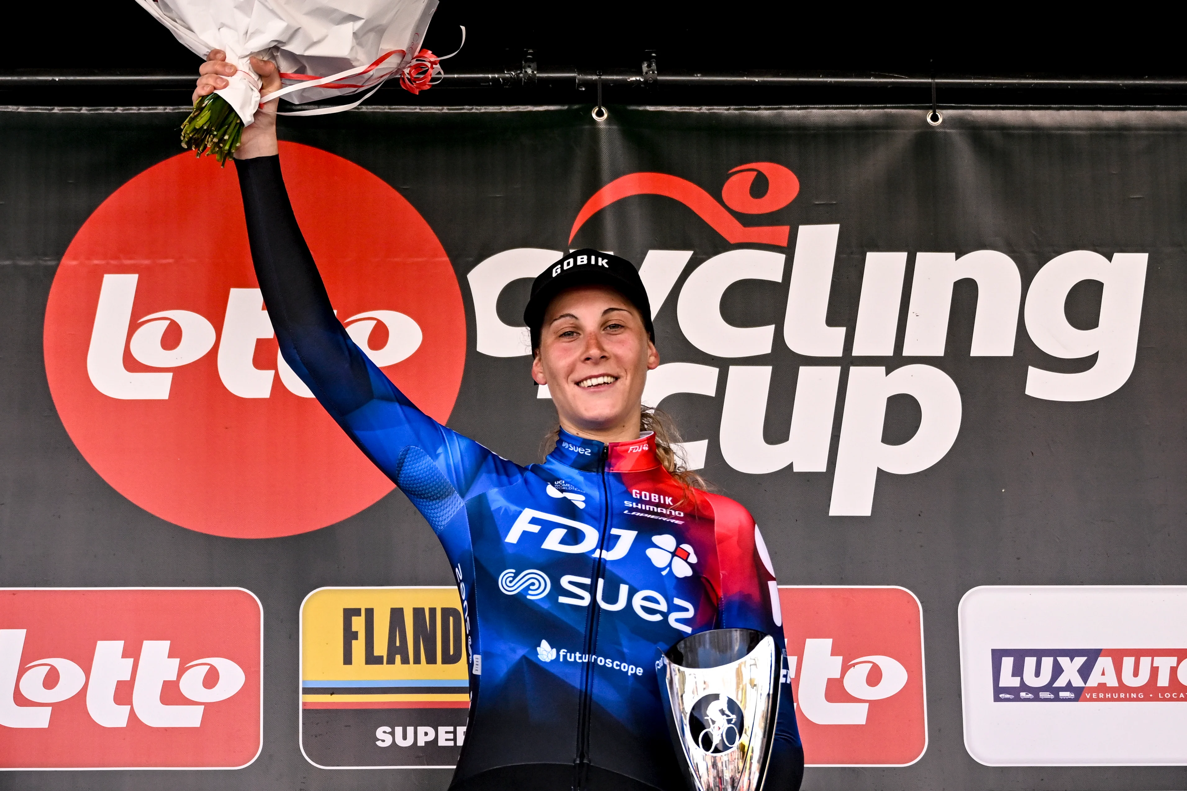 Italian Vittoria Guazzini of FDJ-Suez pictured on the podium after the 'Grand Prix du Samyn' one day cycling race, 202km from Quaregnon to Dour on Tuesday 27 February 2024, the first (out of 10) race of the Lotto Cycling Cup. BELGA PHOTO LAURIE DIEFFEMBACQ