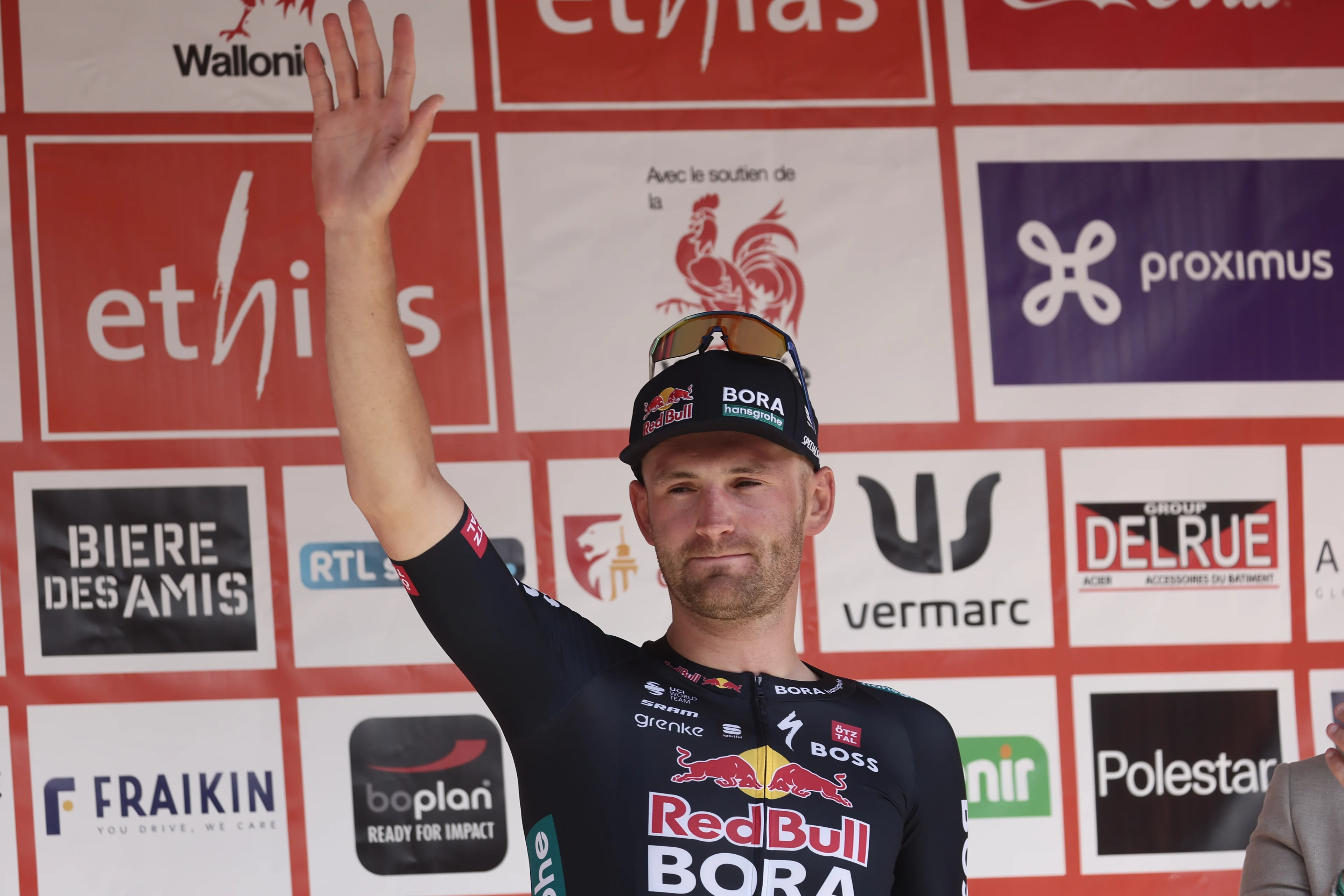 Belgian Jordi Meeus of Red Bull-Bora-Hansgrohe celebrates on the podium after winning stage 1 of the Tour De Wallonie cycling race, from Tournai to Fleurus (178,6 km), Monday 22 July 2024. This year's Tour de Wallonie takes place from 22 to 26 July 2023. BELGA PHOTO BRUNO FAHY