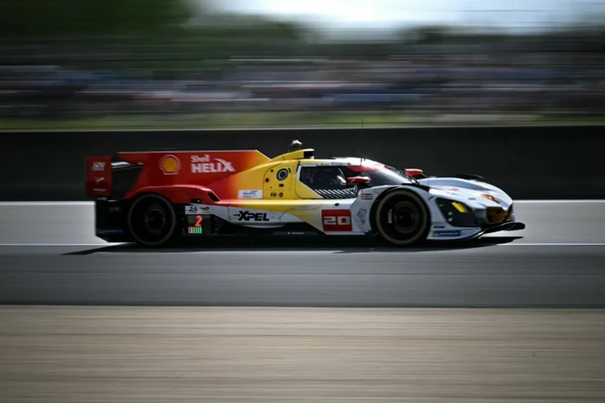 This photograph shows BMW M Team WRT's hypercar driven by Dutch Robin Frijns, German René Rast and South African Sheldon van der Linde during the 94th edition of the 24 Hours of Le Mans at the Le Mans circuit, north-western France on June 13, 2026.  Lou BENOIST / AFP