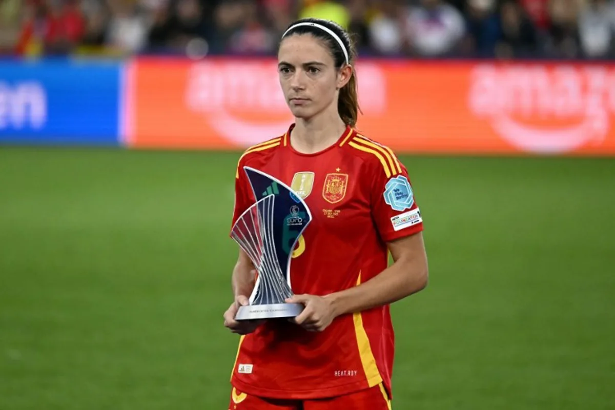 Spain's midfielder #06 Aitana Bonmati holds the trophy after winning Best Player of the Tournament Award after Spain lost to England in the UEFA Women's Euro 2025 final football match between England and Spain at the St. Jakob-Park Stadium in Basel, on July 27, 2025. Fabrice COFFRINI / AFP