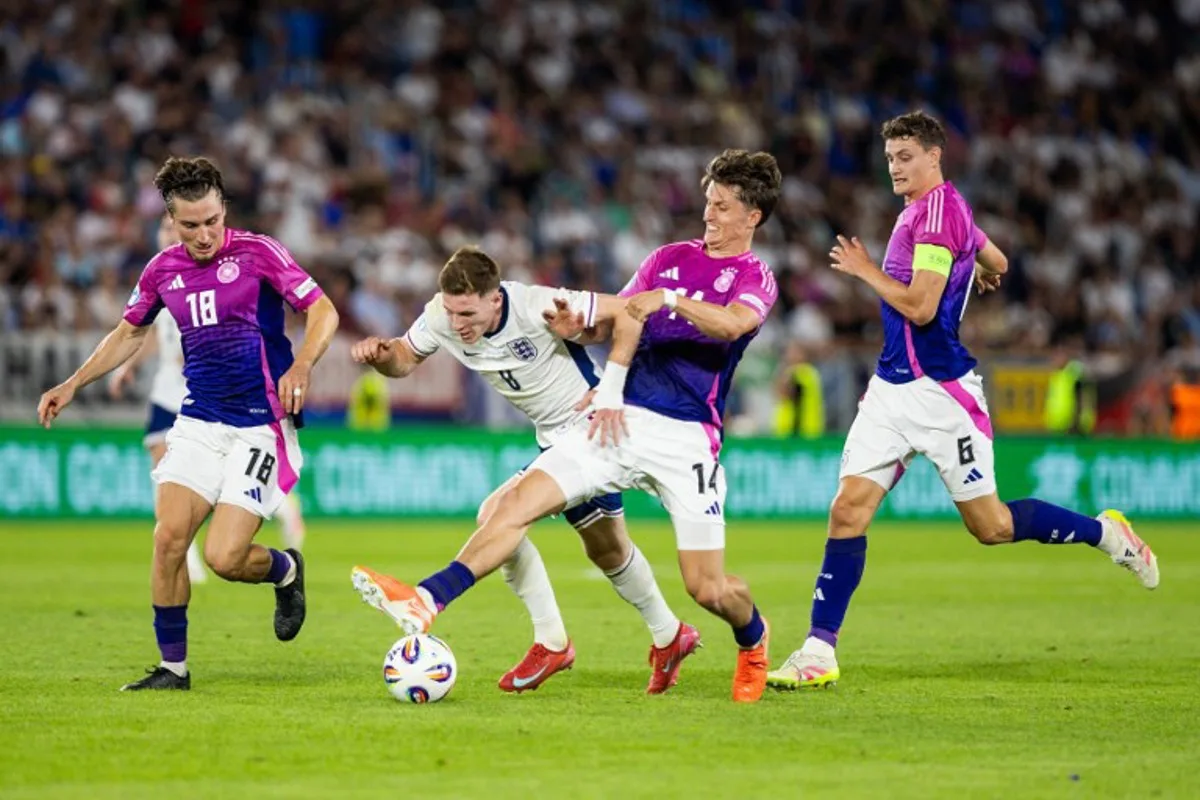 (L-R) Germany's midfielder #18 Rocco Reitz, England's midfielder #08 Elliot Anderson, Germany's defender #14 Tim Oermann and Germany's midfielder #06 Eric Martel vie for the ball during the UEFA U21 European Championship final football match between England and Germany in Bratislava, Slovakia on June 28, 2025. Branislav Racko / AFP