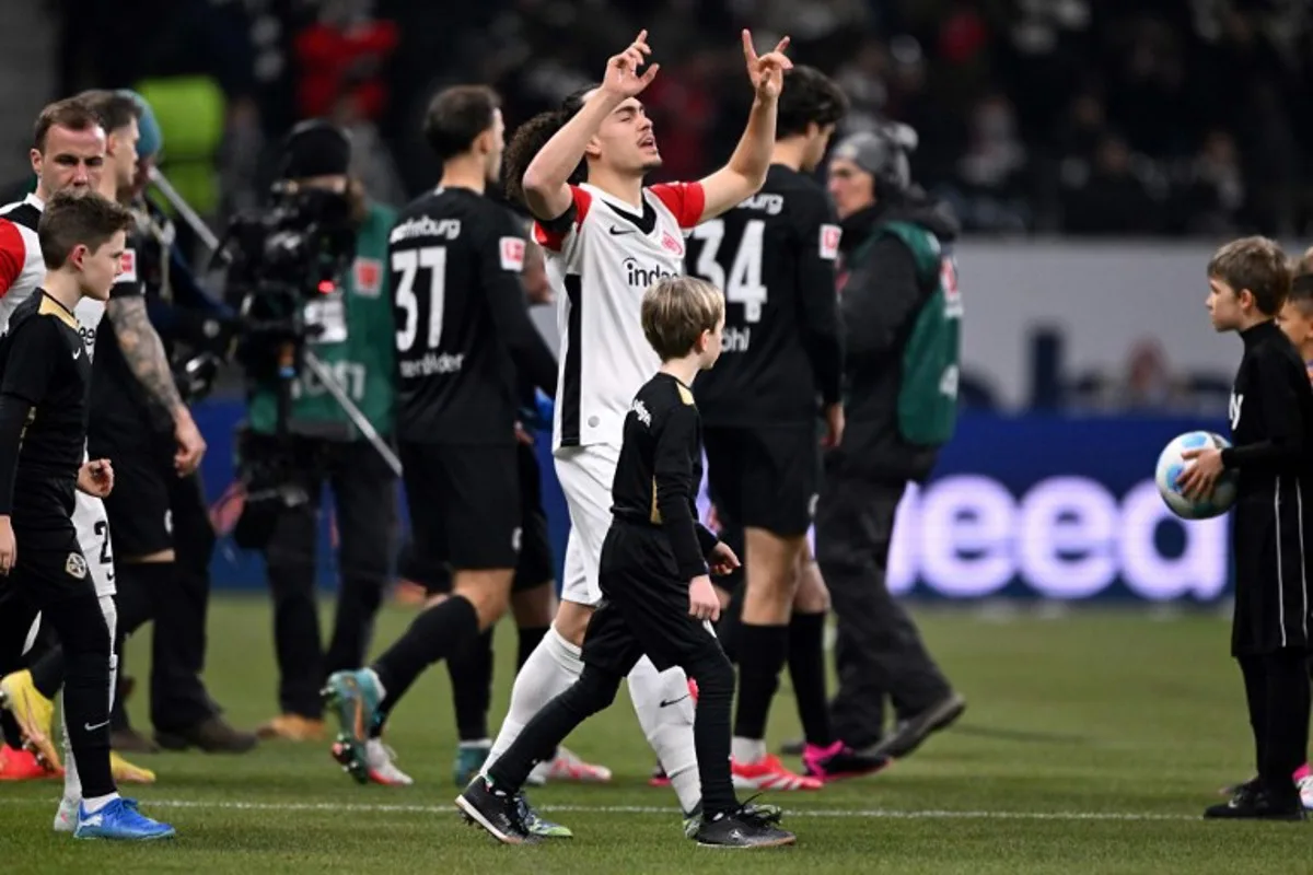 Frankfurt's Belgian defender #03 Arthur Theate reacts prior to the German first division Bundesliga football match between Eintracht Frankfurt and SC Freiburg in Frankfurt am Main, western Germany on January 14, 2025.  Kirill KUDRYAVTSEV / AFP