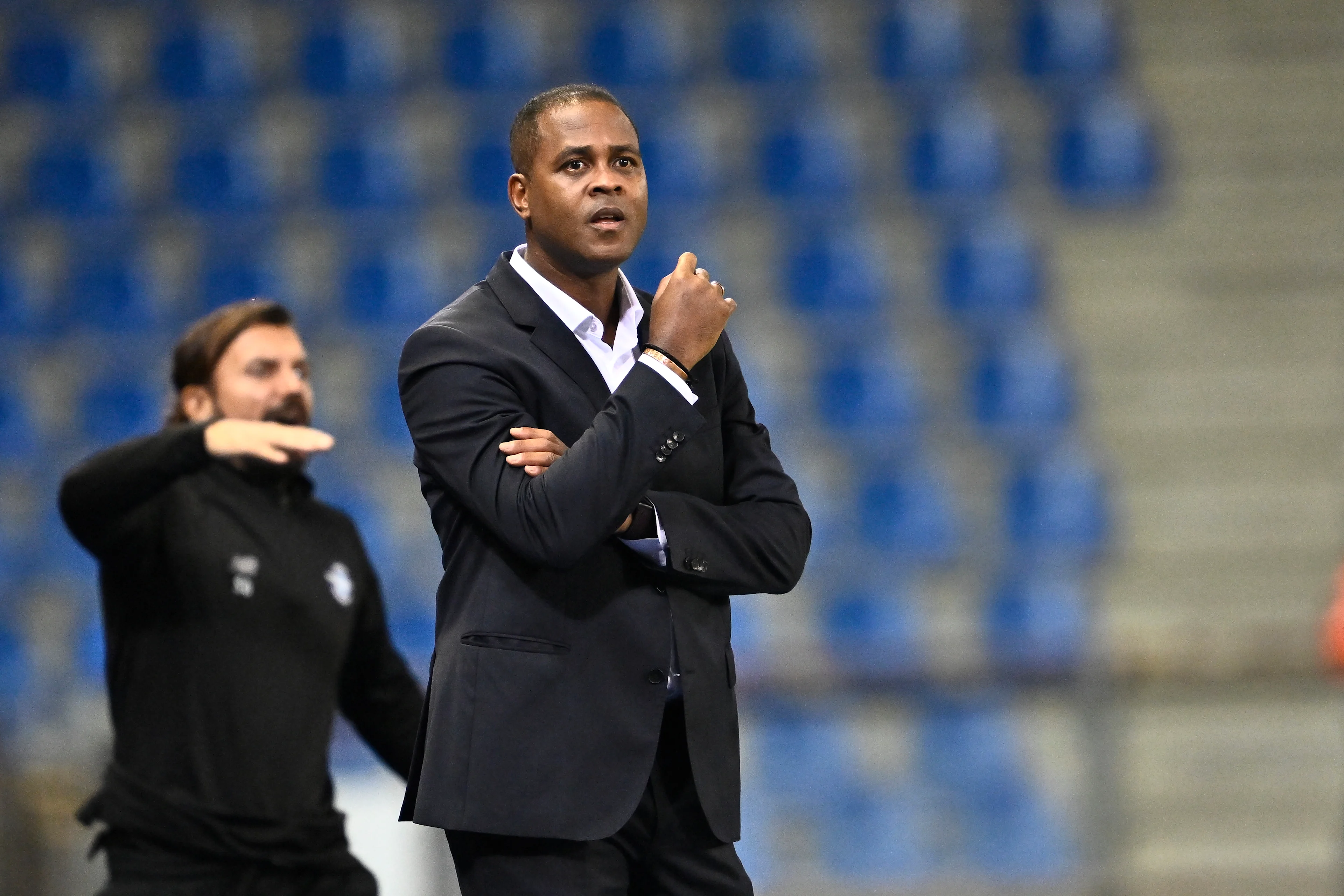 Demirspor's head coach Patrick Kluivert reacts during a soccer game between Belgian KRC Genk and Turkish Adana Demirspor, Thursday 24 August 2023 in Genk, the first leg of the play-offs for the UEFA Conference League competition. BELGA PHOTO JOHAN EYCKENS