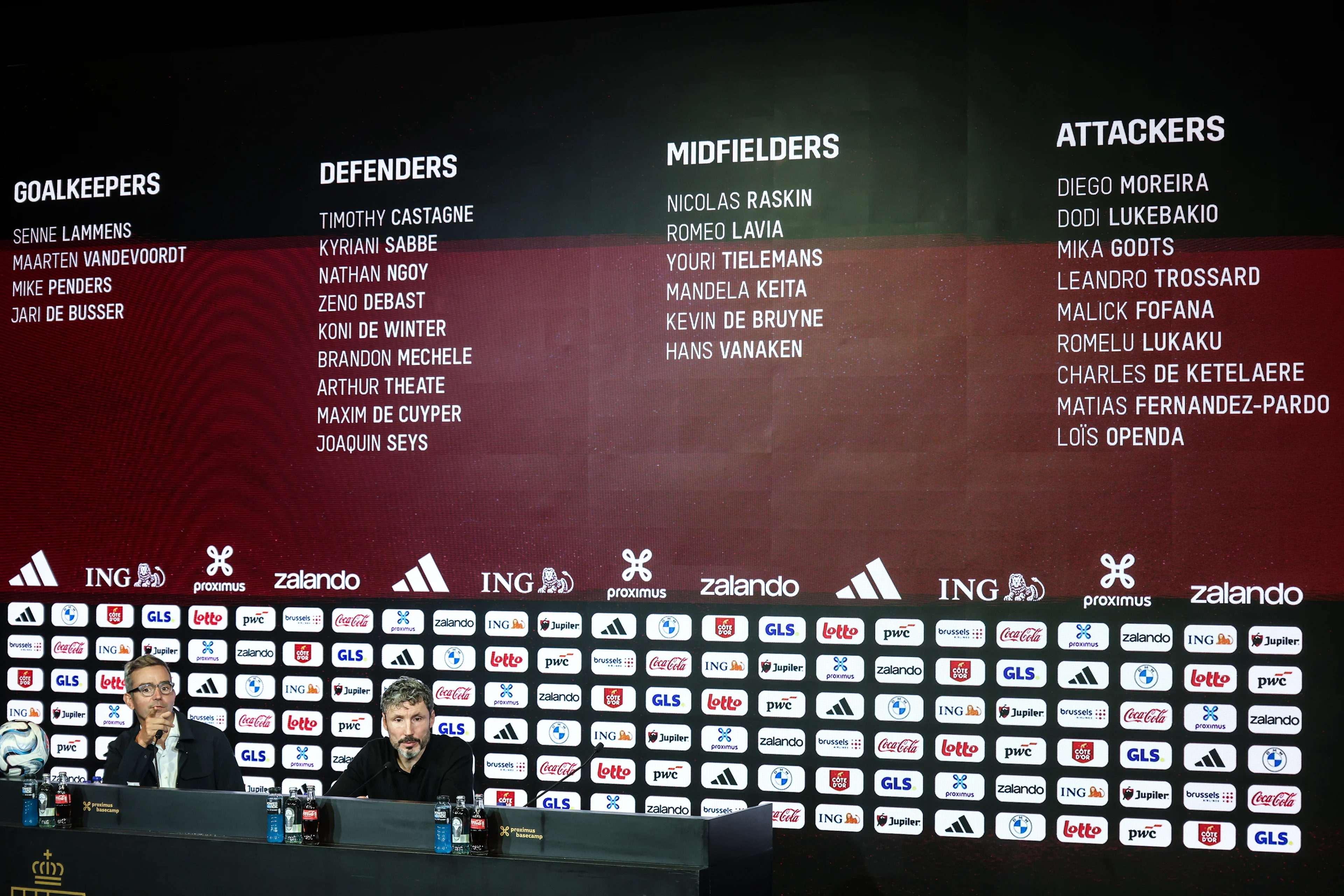 Belgium's spokesman Mathieu Istace and Belgium's head coach Mark van Bommel are pictured during a press conference to announce the selection of the Red Devils, the Belgian national soccer team, at the national training center in Tubize, Friday 18 September 2026. The team is preparing for fixtures in the UEFA Nations League competition. BELGA PHOTO BRUNO FAHY