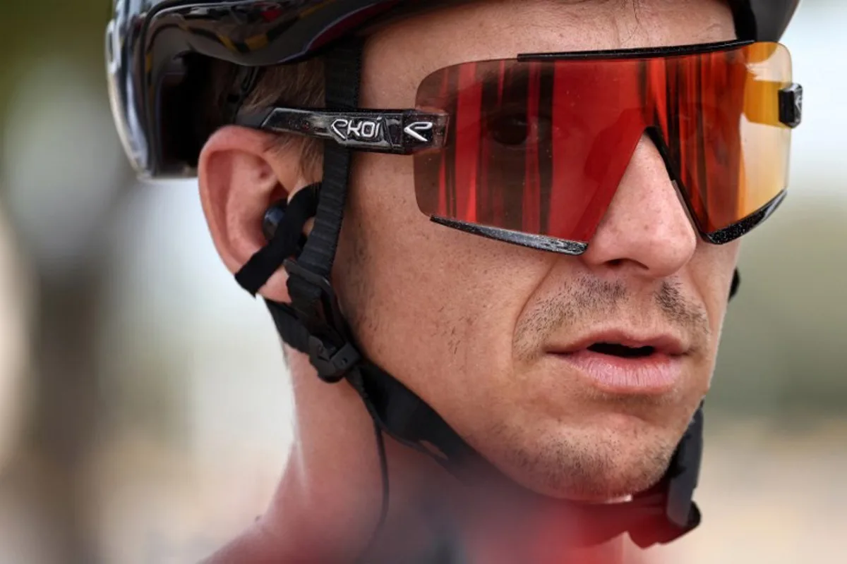 France's Bryan Coquard (Cofidis) prepares before the start of the third stage of the Tour of Oman, shortened to 76 kilometres between Naseem Garden and al-Bustan due to weather conditions, in Muscat on February 12, 2024.  Anne-Christine POUJOULAT / AFP