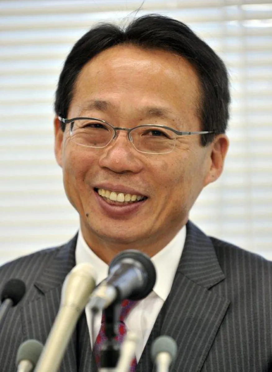 Former Japanese national team head coach Tokeshi Okada smiles as he announces he will join China's Hangzhou Greentown football club during a presser in Tokyo on December 16, 2011. Former Japan coach Takeshi Okada joined China's Hangzhou Greentown December 15, further bolstering the Super League's ranks just days after the landmark signing of French star Nicolas Anelka. AFP PHOTO / Yoshikazu TSUNO YOSHIKAZU TSUNO / AFP