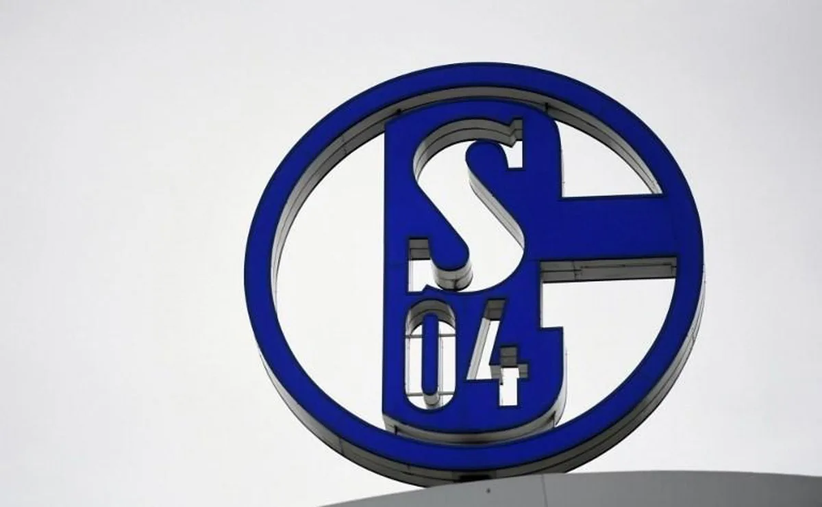 A picture taken on July 1, 2020 shows the club's logo at the headquarters of German Bundesliga football club Schalke 04 in Gelsenkirchen, western Germany.  The future of cash-strapped Bundesliga club Schalke 04 is uncertain after their billionaire backer and chairman Clemens Toennies resigned on June 30, 2020 following fan protests over his management of the club. Ina FASSBENDER / AFP