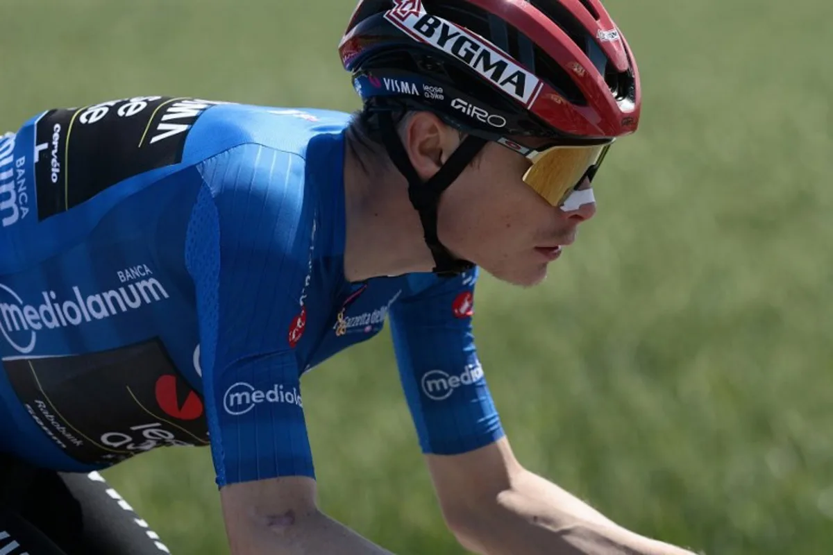 Team Visma Lease a Bike Danish rider Jonas Vingegaard, wearing the best climber's blue jersey (Maglia Azzura), rides during the 9th stage of the Giro d'Italia 2026 - Tour of Italy cycling race between Cervia and Corno alle Scale, central Italy on May 17, 2026.  Luca Bettini / AFP