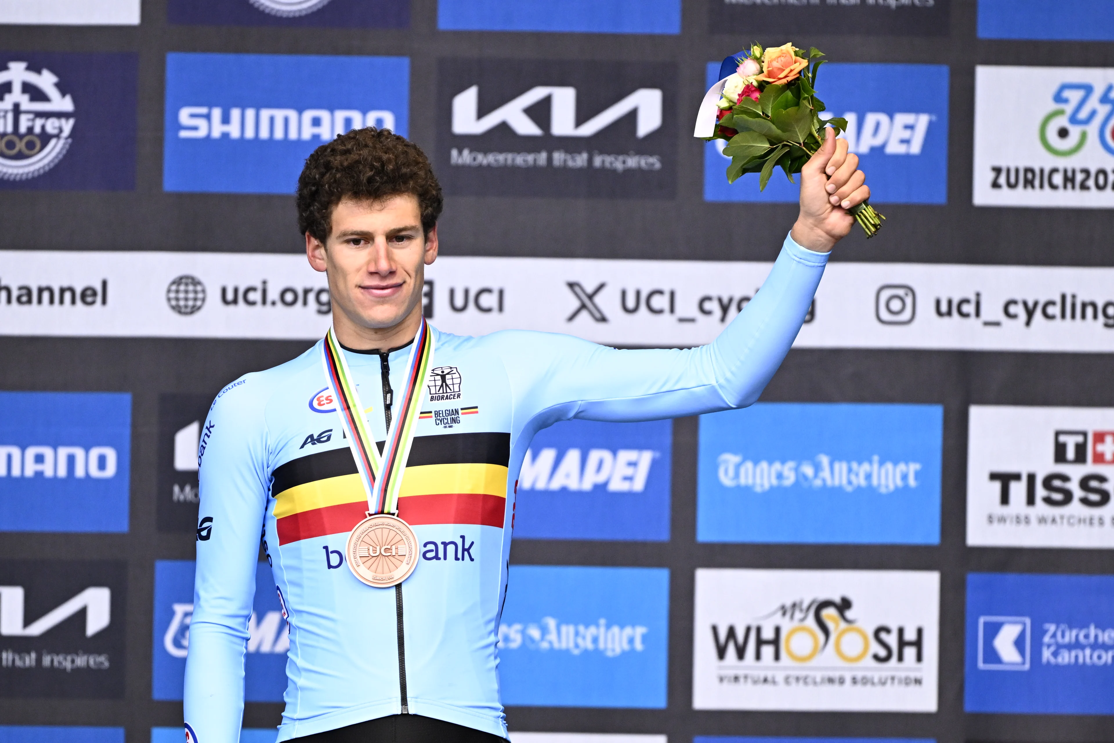 Belgian bronze medallist Alec Segaert celebrates on the podium of the U23 Men road race at the 2024 UCI Road and Para-Cycling Road World Championships, Friday 27 September 2024, in Zurich, Switzerland. The Worlds are taking place from 21 to 29 September. BELGA PHOTO JASPER JACOBS