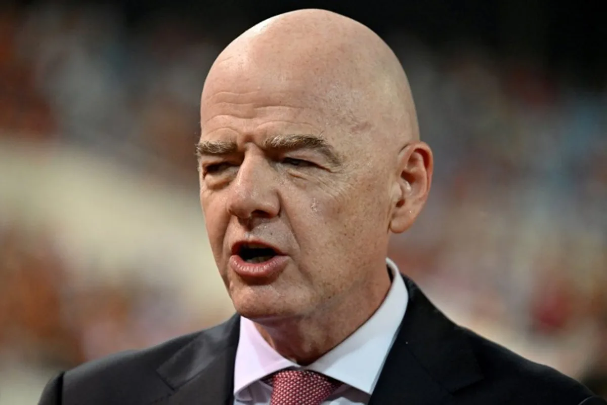 FIFA President Gianni Infantino reacts during the award ceremony at the end of the ASEAN Championship Cup 2026 final football match between Vietnam and Thailand in My Dinh National Stadium in Hanoi on August 26, 2026.  Nhac NGUYEN / AFP