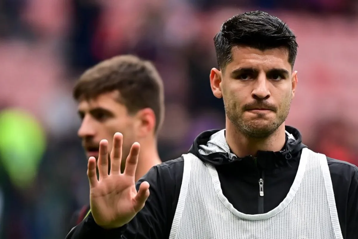 AC Milan's Spanish forward #7 Alvaro Morata reacts during the warm up prior to the Italian Serie A football match between AC Milan and Parma at the San Siro Stadium in Milan, on January 26, 2025  Piero CRUCIATTI / AFP