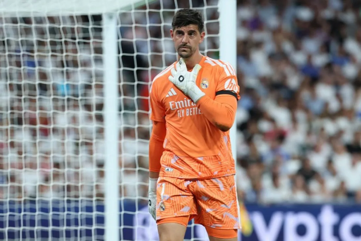 Real Madrid's Belgian goalkeeper #01 Thibaut Courtois gestures after recovering from an injury during the UEFA Champions League first round day 1 football match between Real Madrid and Inter Milan at the Santiago Bernabeu stadium in Madrid on September 8, 2026.  Thomas COEX / AFP