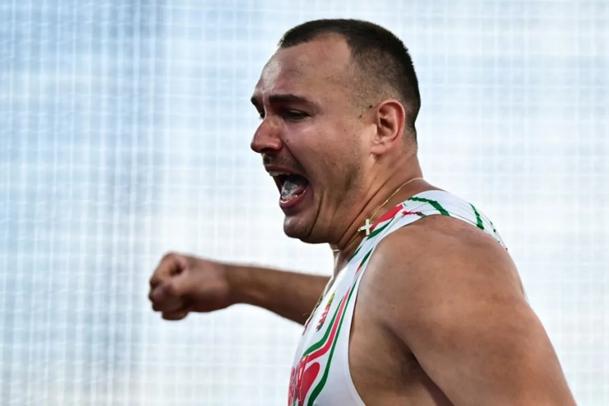 Hungary's Bence Halasz reacts as he competes in the men's hammer throw final during the European Athletics Championships at Alexander Stadium in Birmingham on August 11, 2026.  Ben STANSALL / AFP