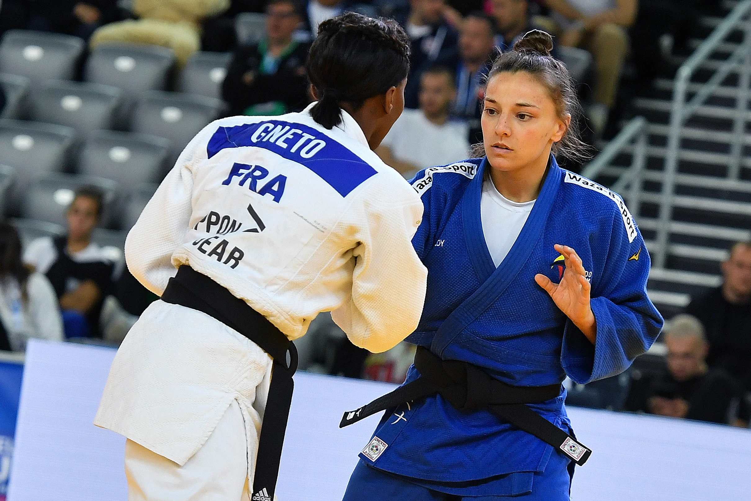 Belgian Mina Libeer (blue) and French Priscilla Gneto (white) pictured in action during a fight in the women's -57kg competition at the European Championships judo in Zagreb, Croatia on Thursday 25 April 2024. The tournament is taking place from 25 tot 27 April. BELGA PHOTO NIKOLA KRSTIC