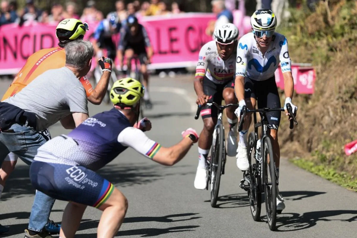 Movistar Team Spanish rider Enric Mas and UAE Team Emirates - XRG Ecuadorian rider Jhonatan Narvaez (L) ride in a breakaway during the 11th stage of the Giro d'Italia 2026 - Tour of Italy cycling race between Porcari and Chiavari, Italy, on May 20, 2026. Luca Bettini / AFP