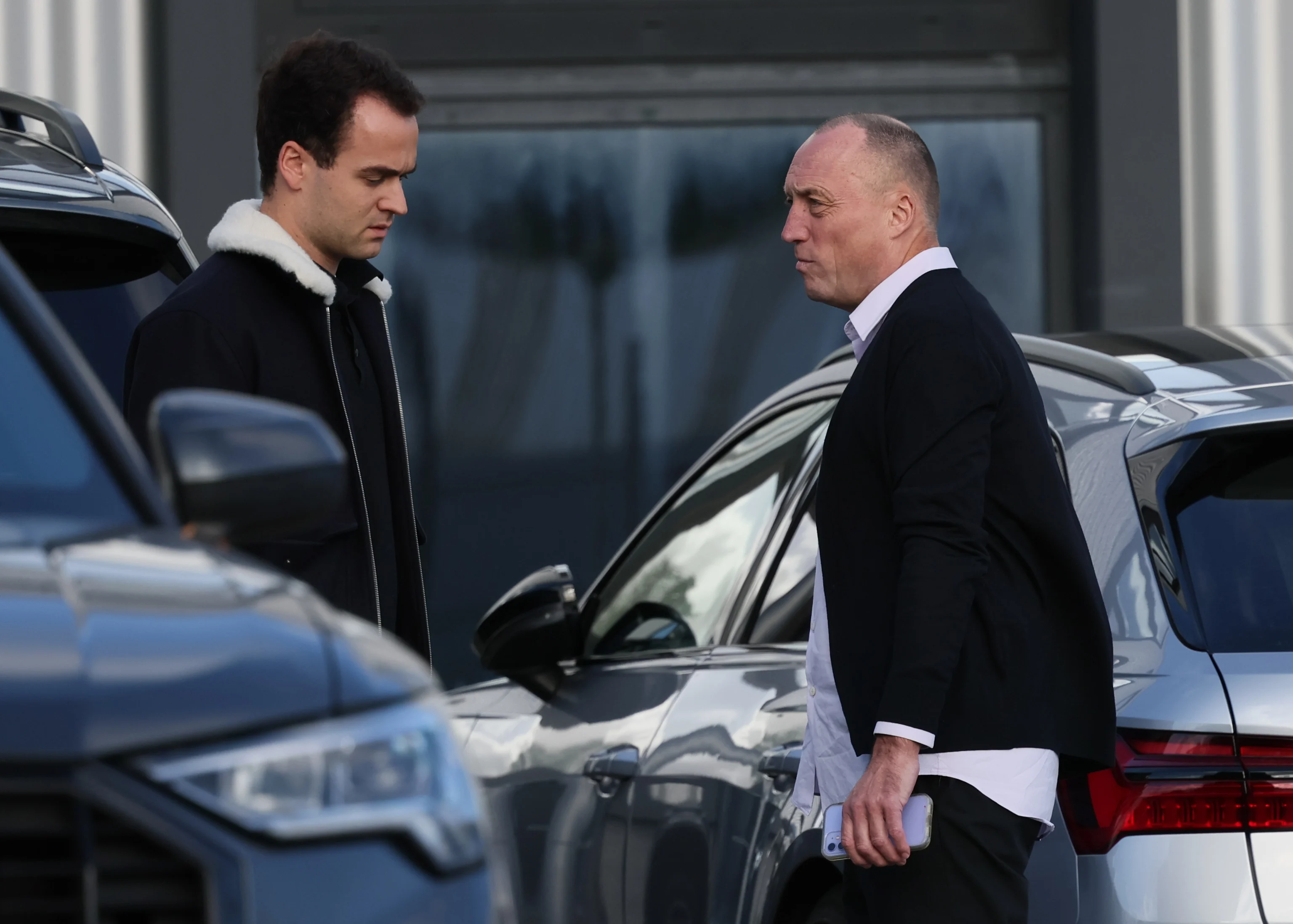 Anderlecht's Chief Legal Officer Thibault Dochy and Anderlecht's chairman Wouter Vandenhaute (R) leaves after a meeting of the RSC Anderlecht board at the national training center in Tubize, Monday 24 October 2022. The Anderlecht board discuses the dismissal of coach Mazzu. BELGA PHOTO BENOIT DOPPAGNE