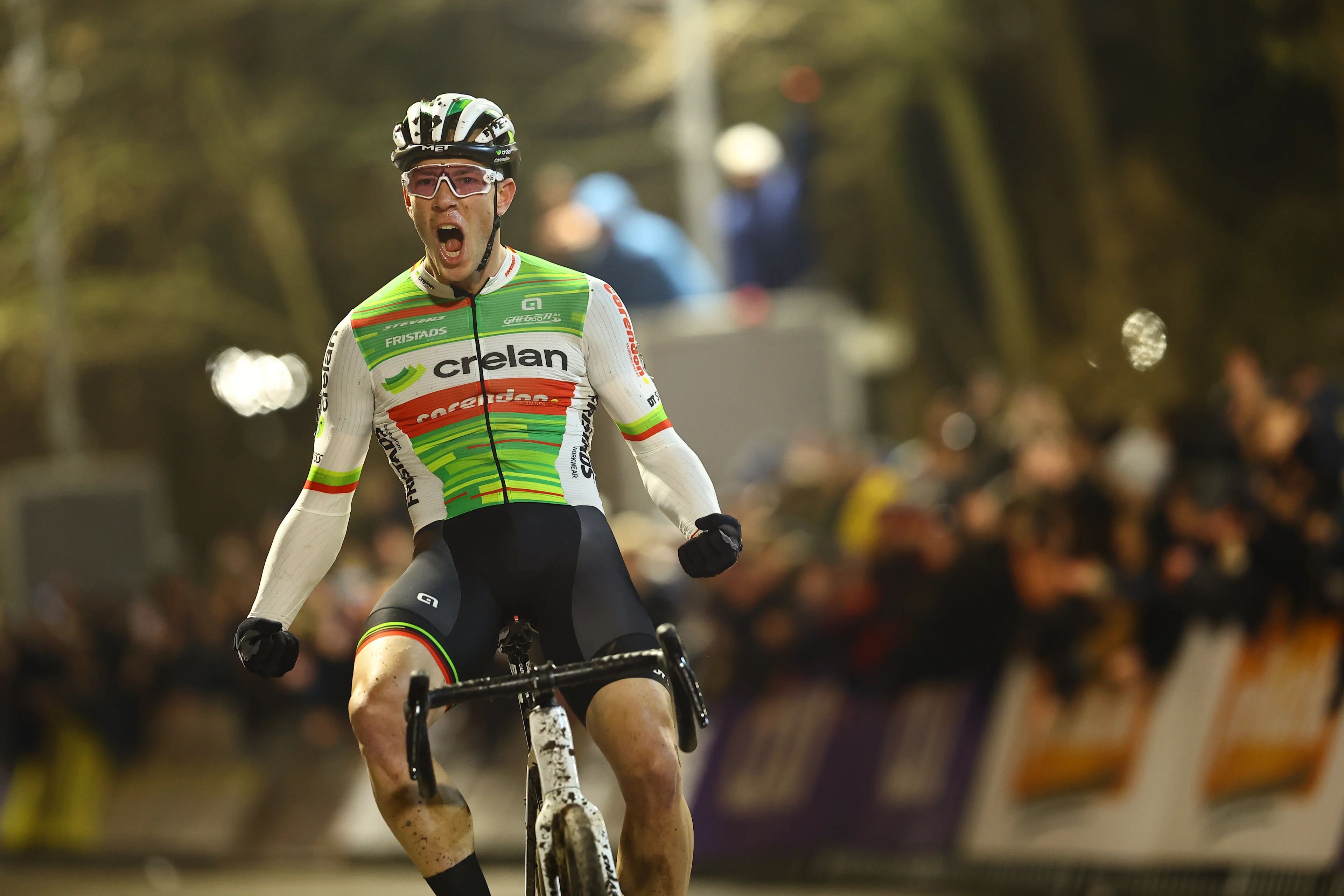 Belgian Laurens Sweeck celebrates as he crosses the finish line to win the men elite race of Diegem Cross cyclocross cycling event, Monday 30 December 2024 in Diegem, stage 6/8 in the Superprestige cyclocross cycling competition. BELGA PHOTO DAVID PINTENS